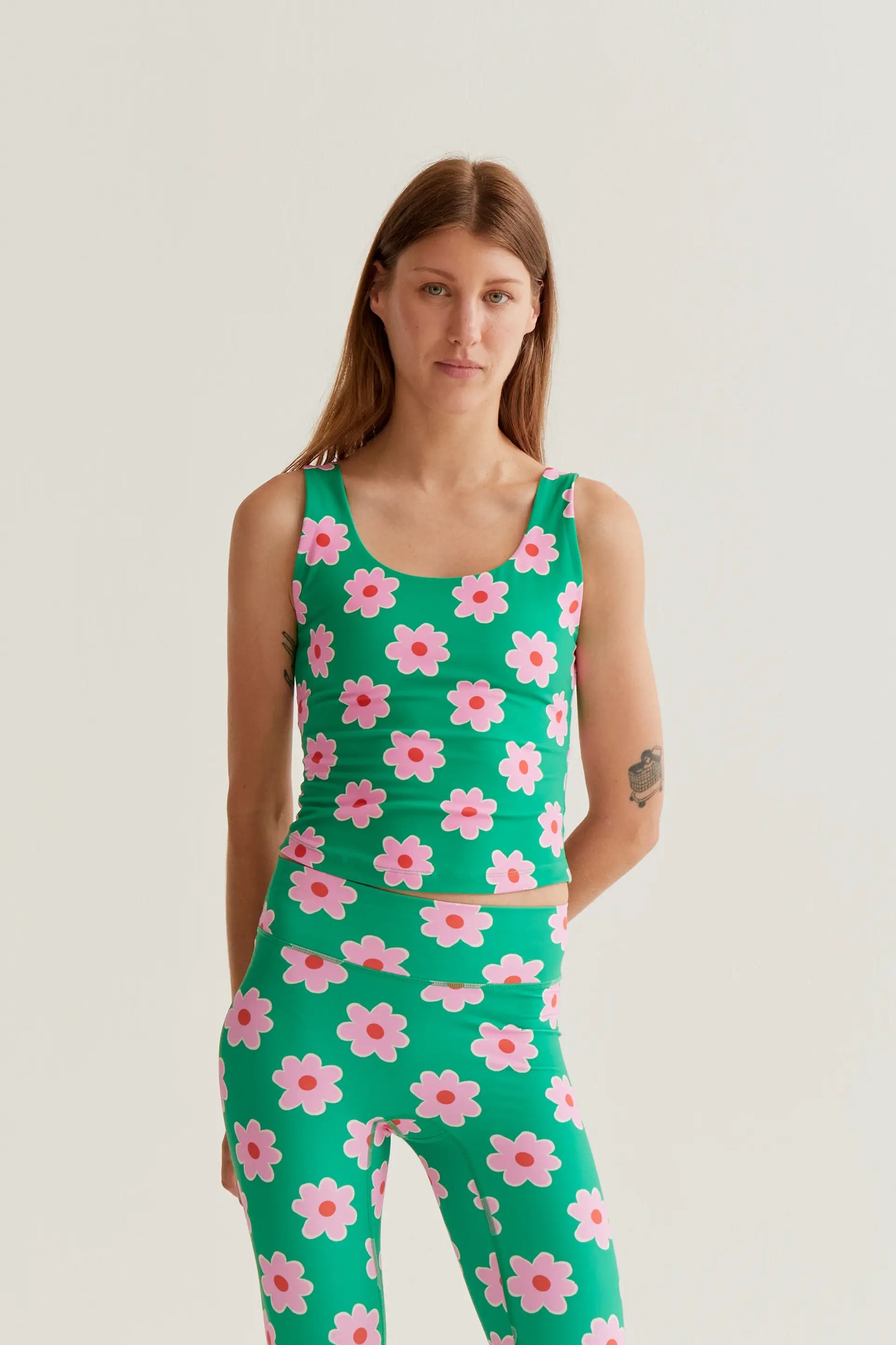 Top sportivo con stampa di fiori rosa