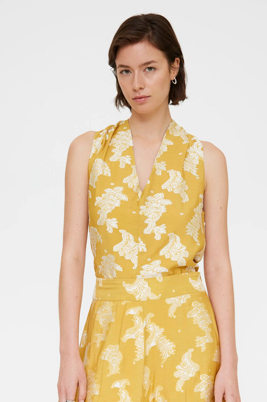 Top con estampado amarillo