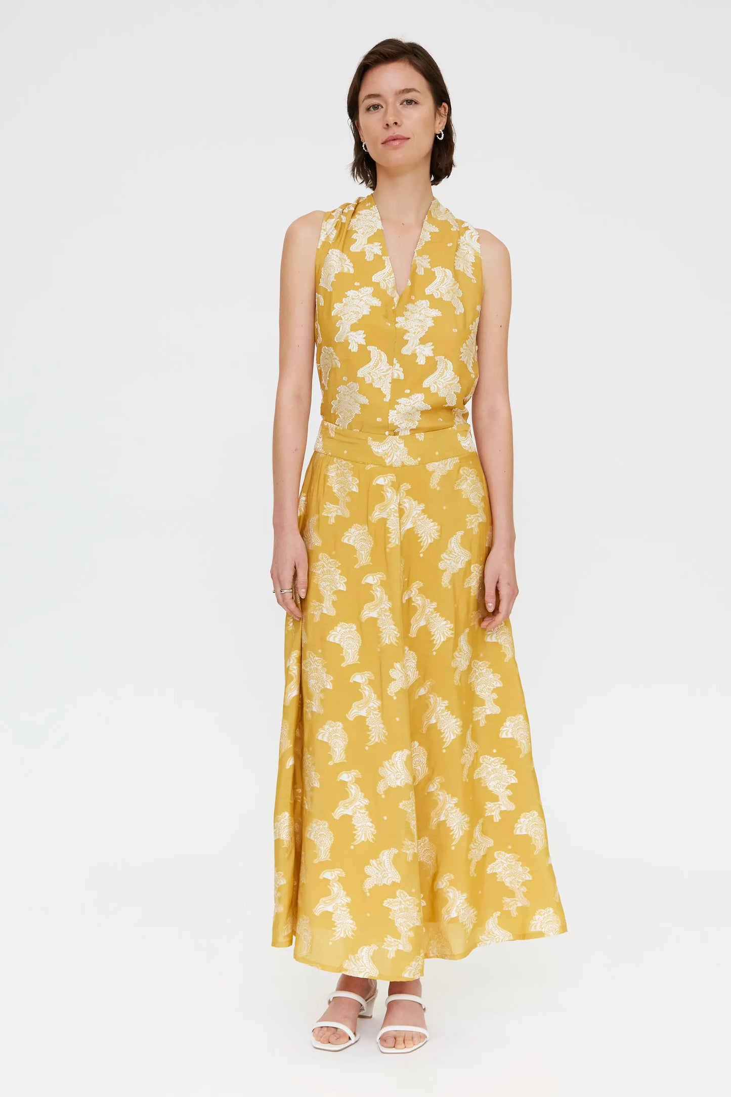 Top con stampa gialla