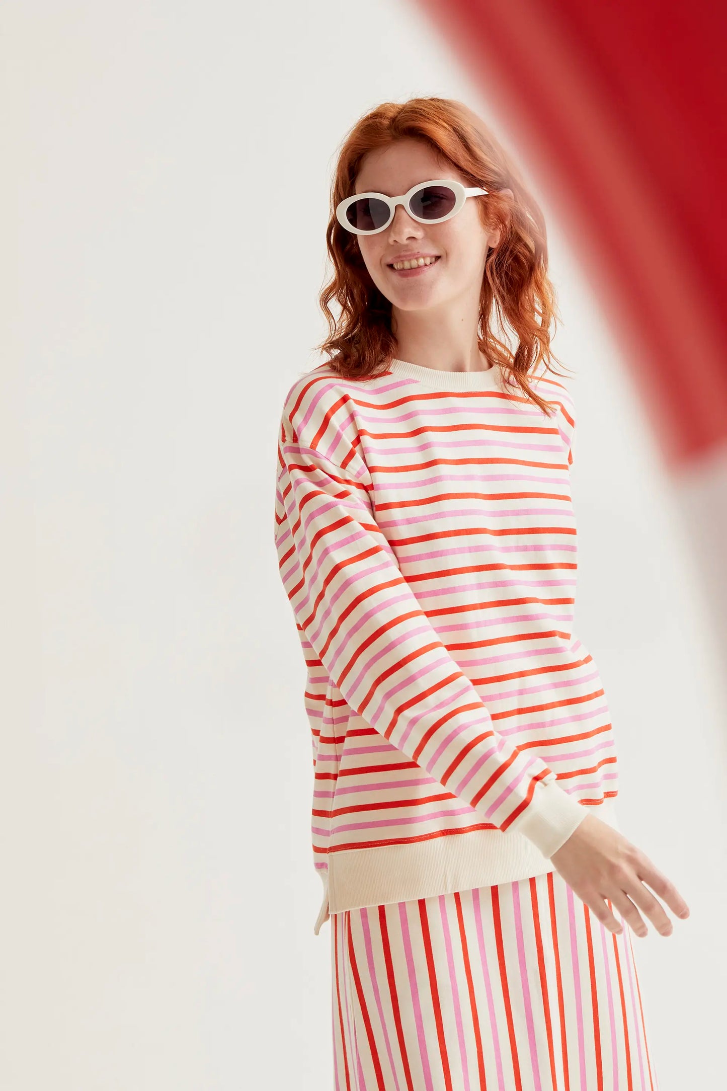 Midi skirt with pink and red striped print