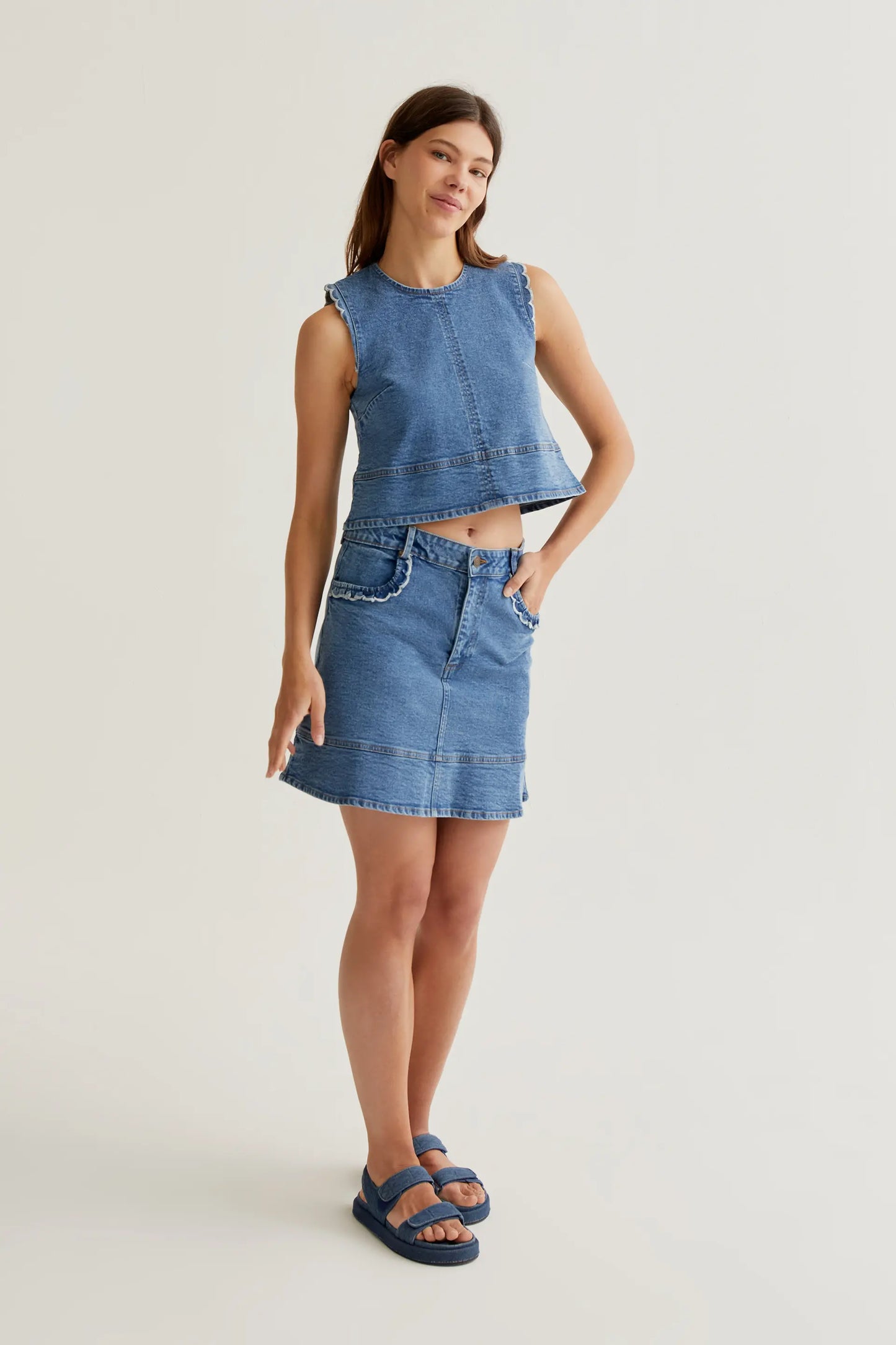 Blue denim skirt with ruffle detail