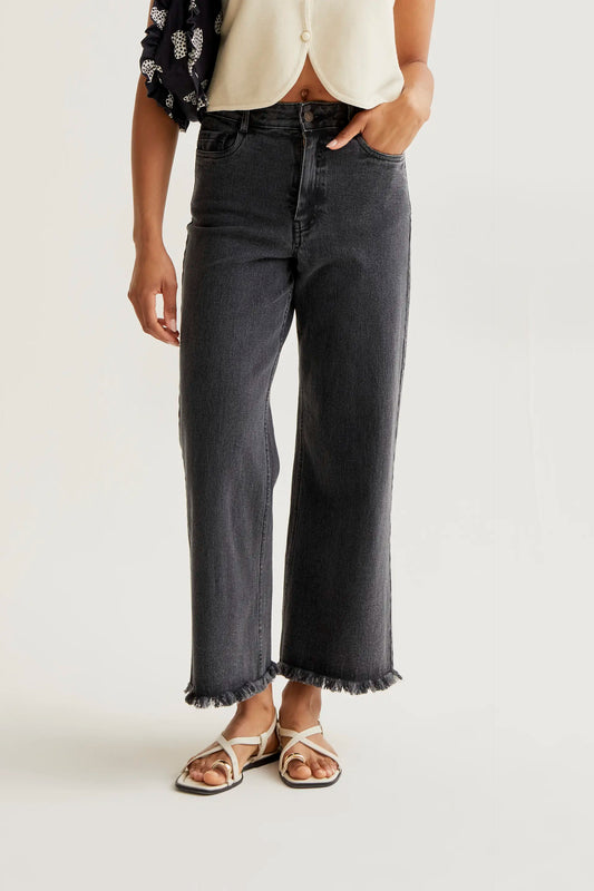 Black jeans with raw-cut hem