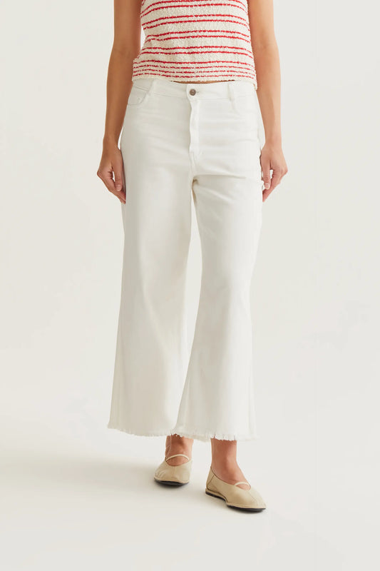 White jeans with raw-cut hem