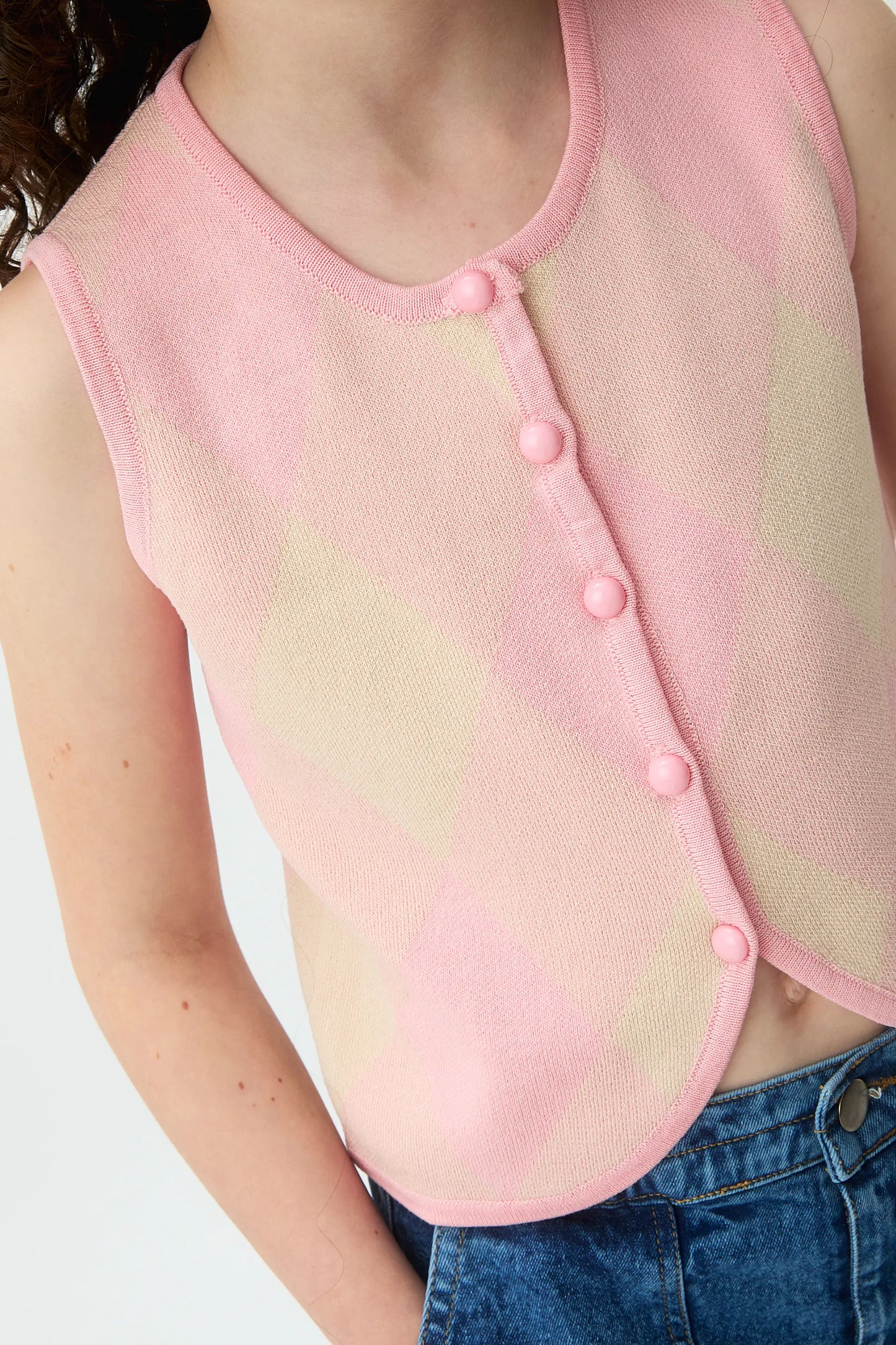 Chaleco de punto jacquard de niña con rombos rosas
