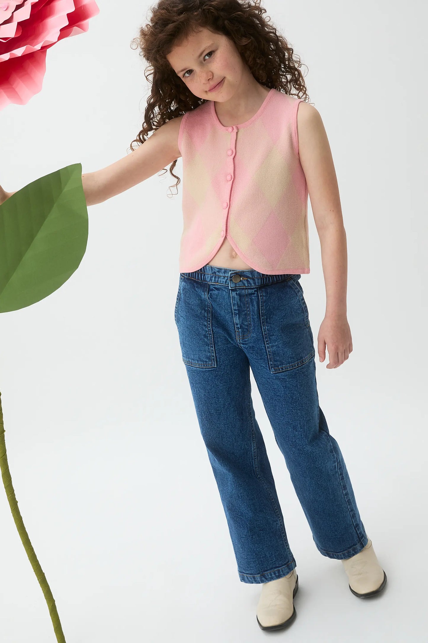 Chaleco de punto jacquard de niña con rombos rosas