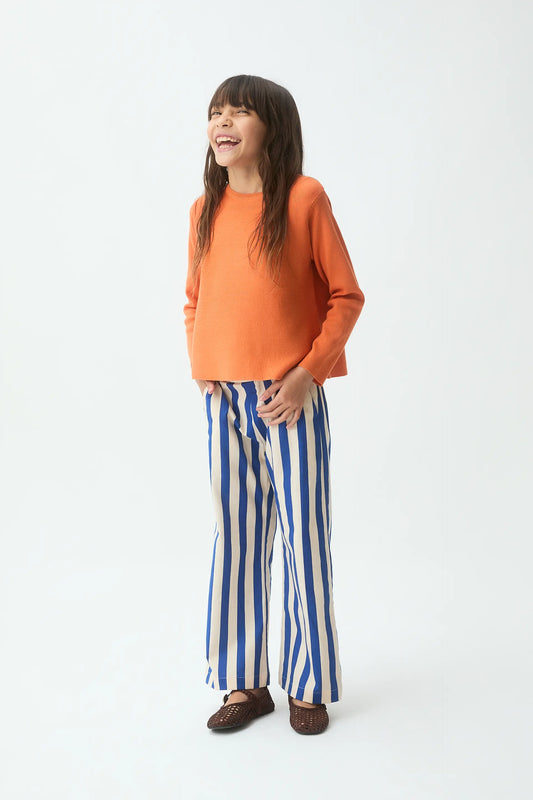 Maglione arancione lavorato a maglia per bambina