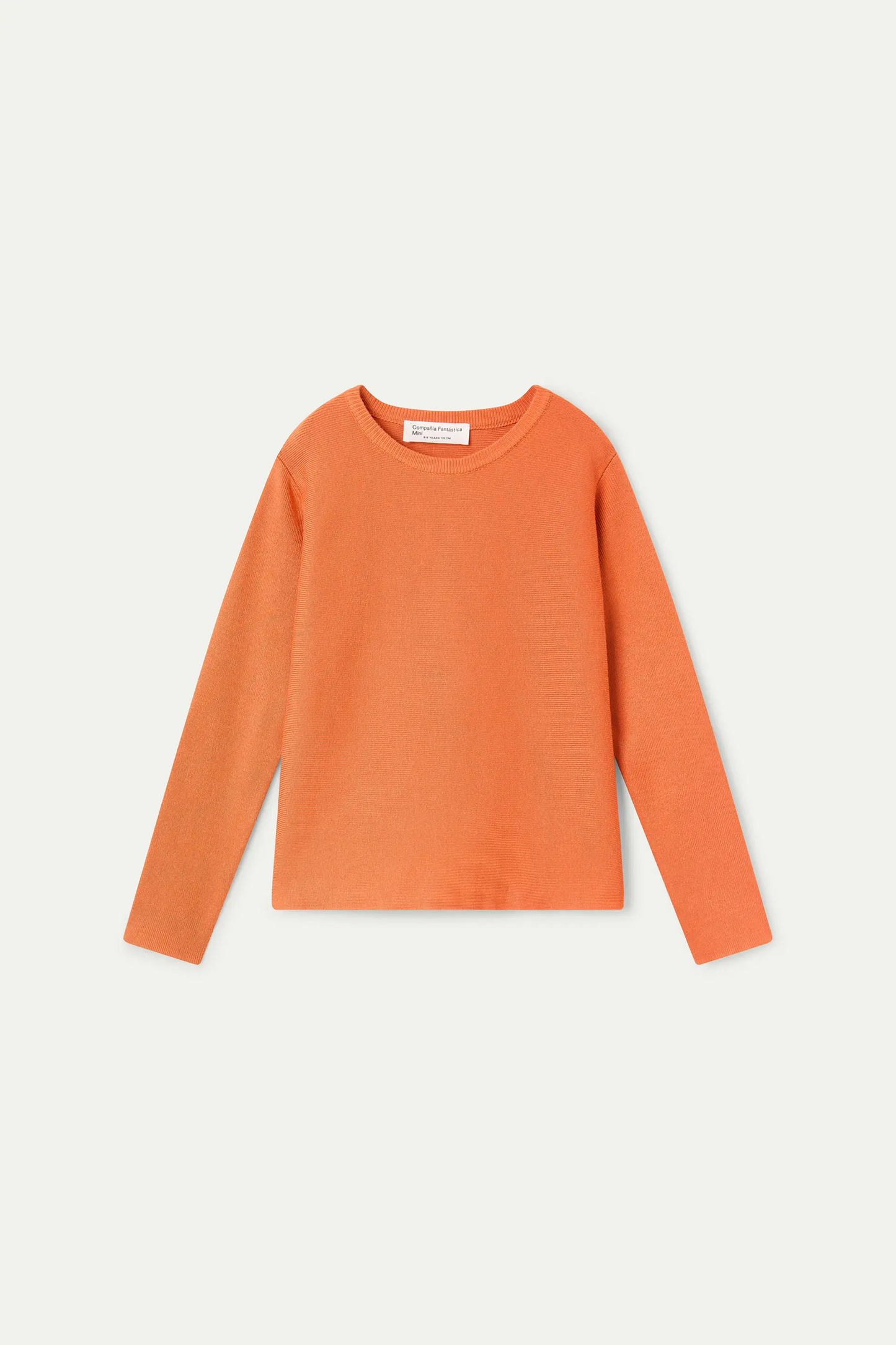 Maglione arancione lavorato a maglia per bambina