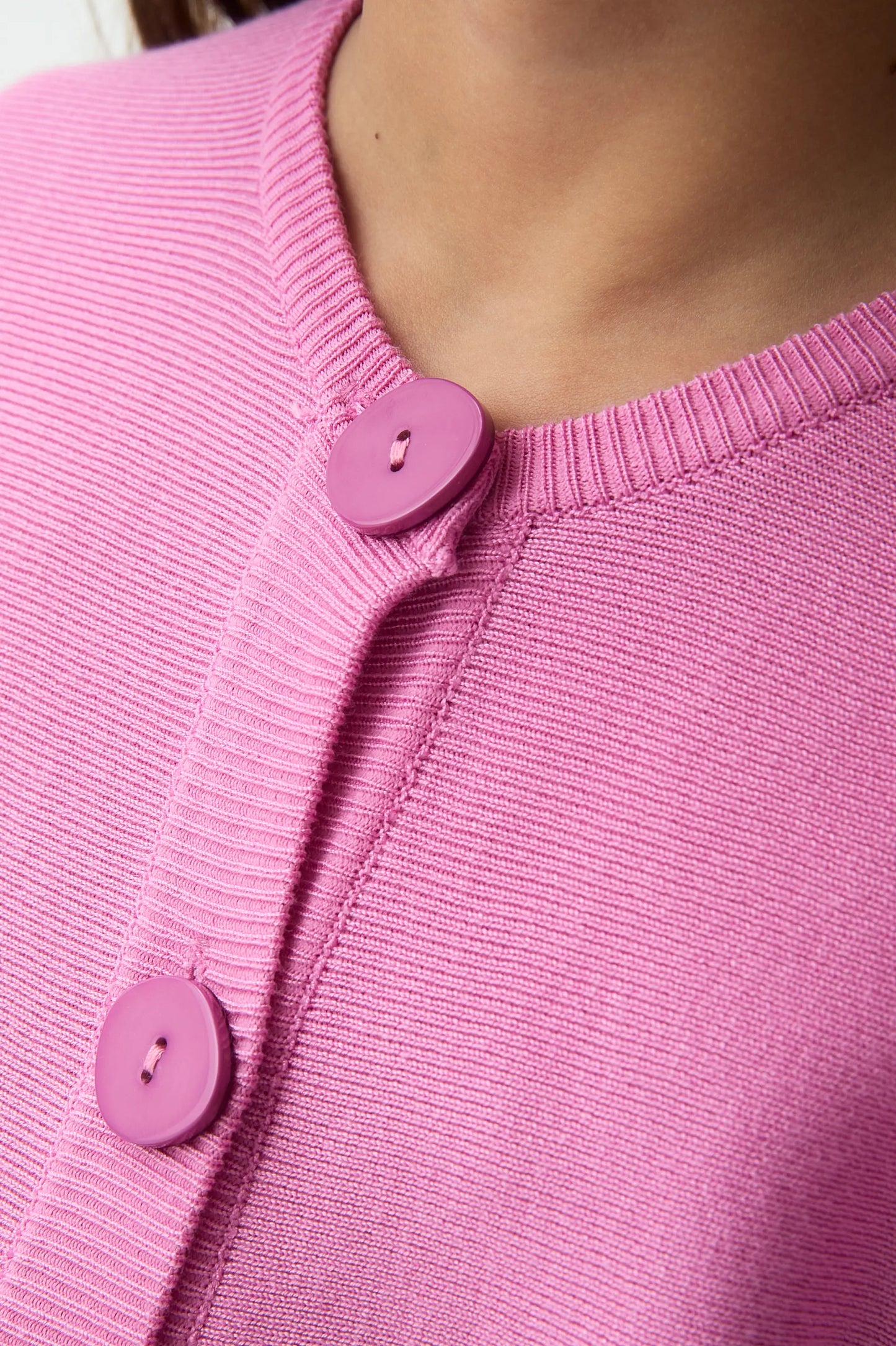 Cárdigan de niña punto rosado