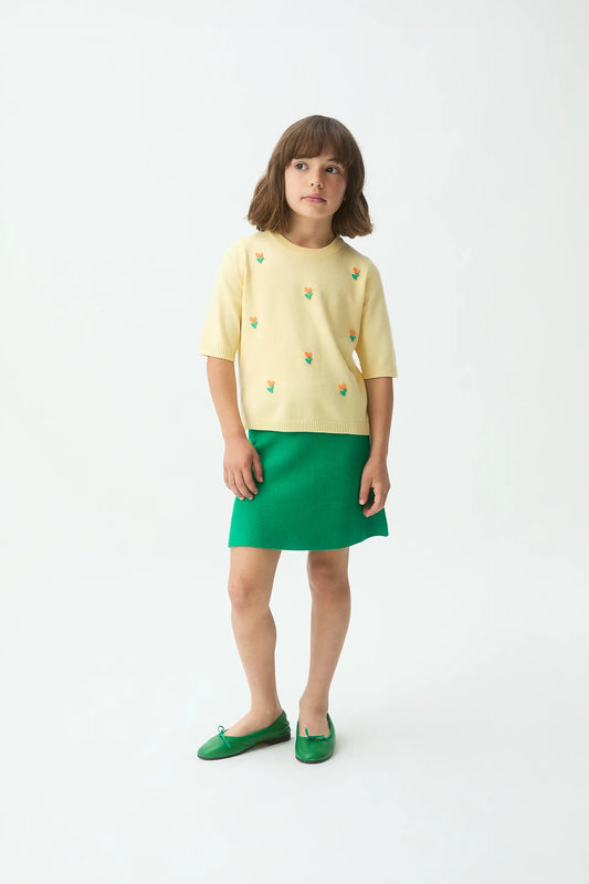 Top in maglia gialla per bambine con dettagli floreali