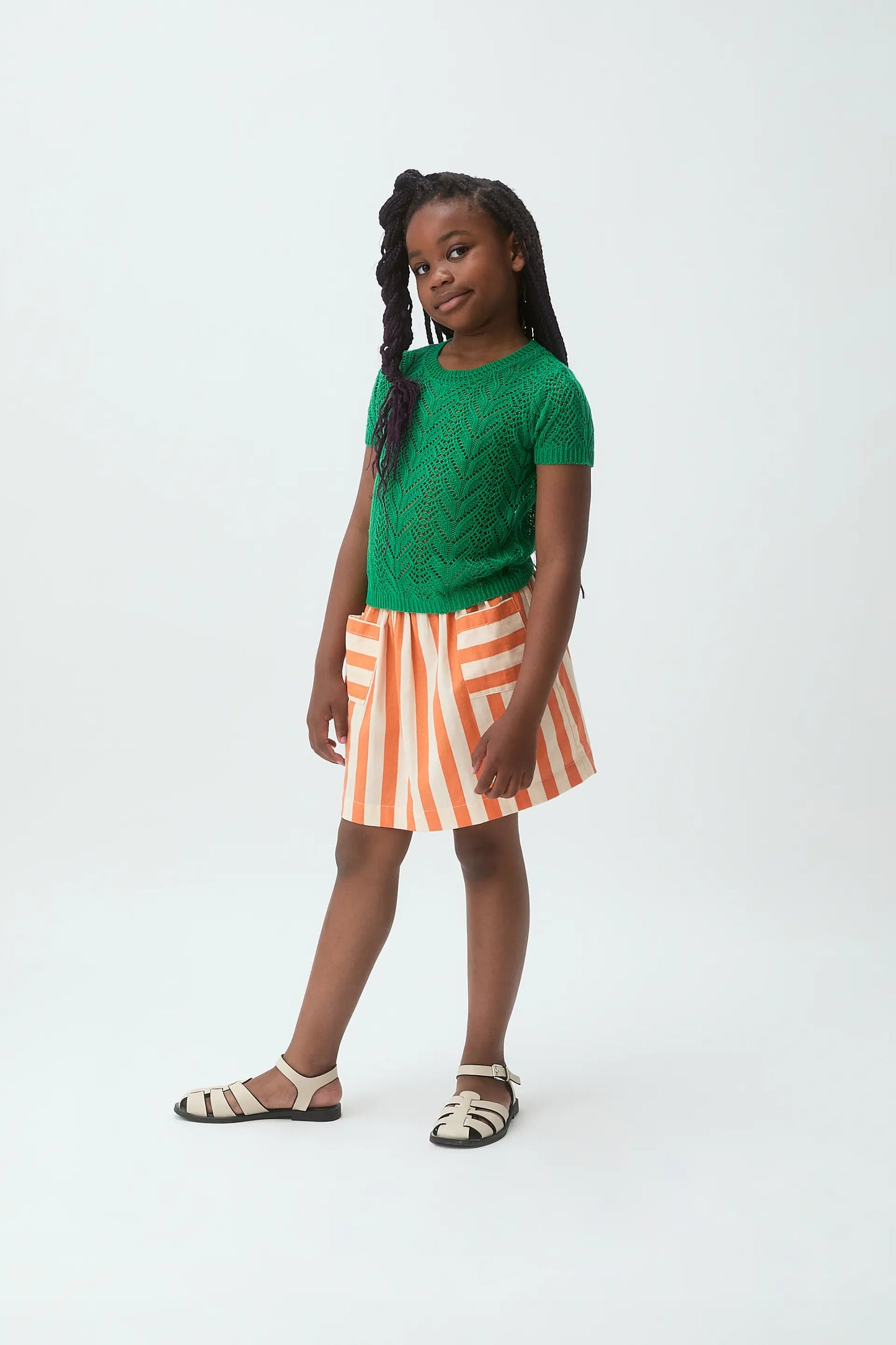 Girl's sweater with green embroidery