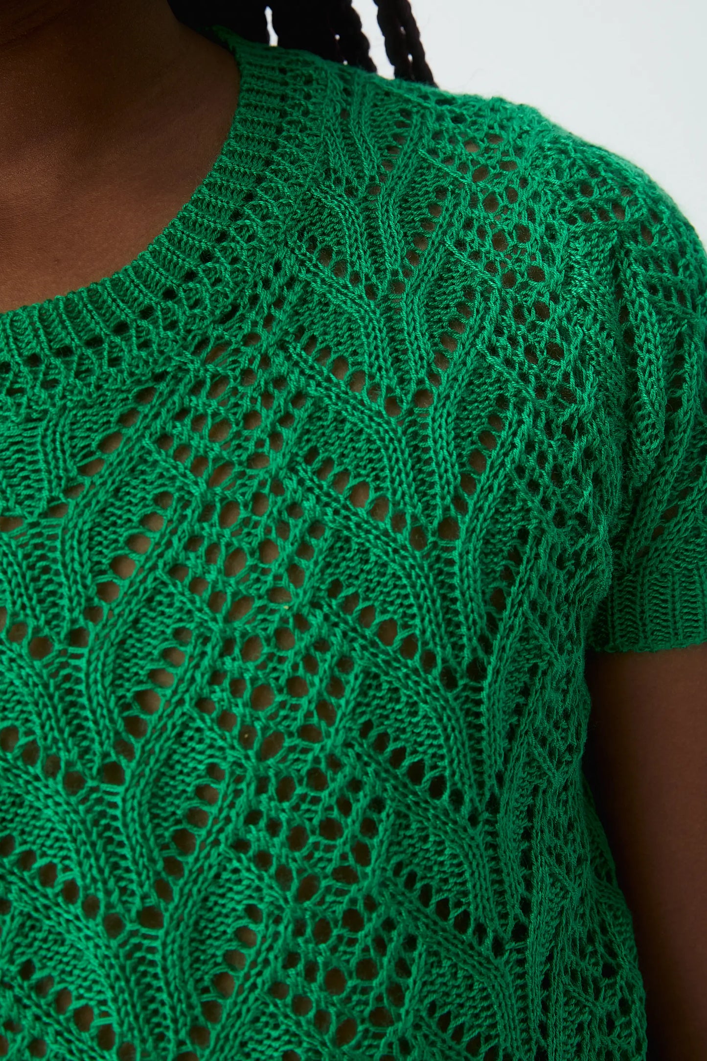 Girl's sweater with green embroidery