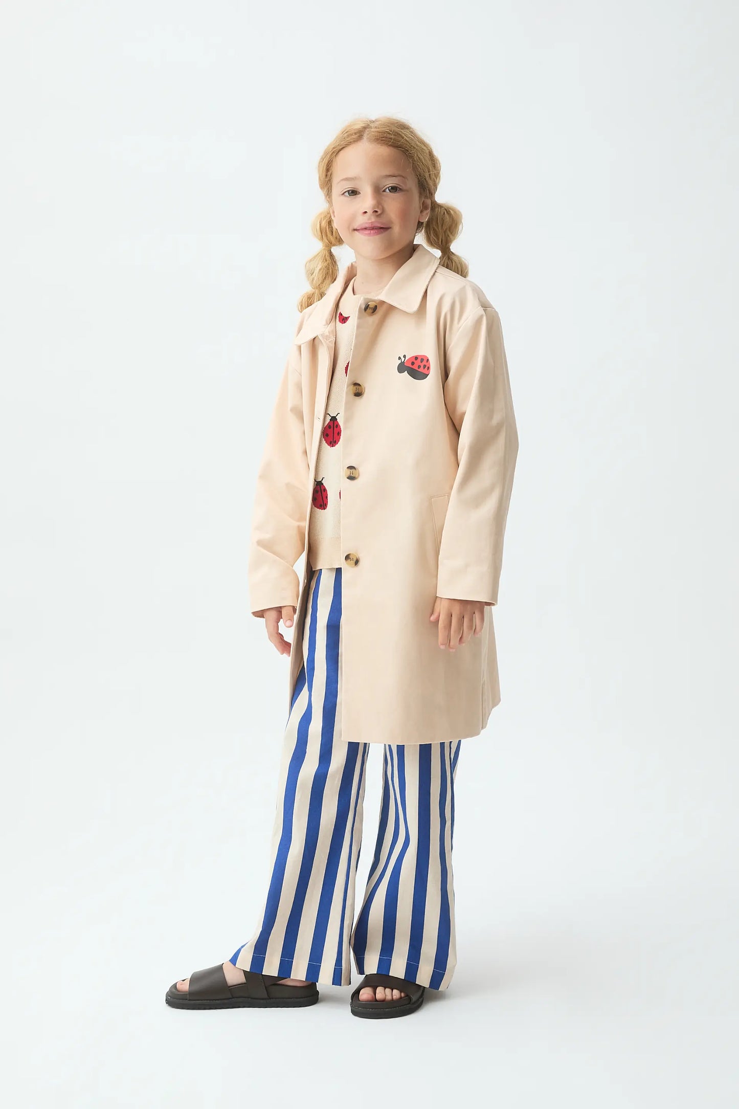 Girl's trench coat with ladybug print