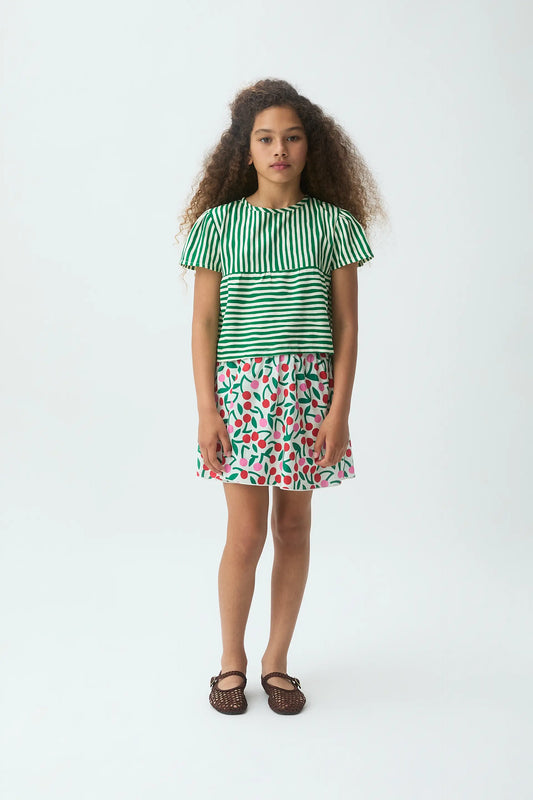 Falda corta de niña con estampado Guinda