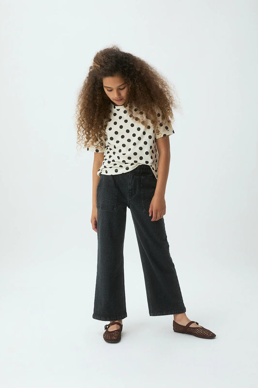 Camiseta de niña con estampado de lunares negro