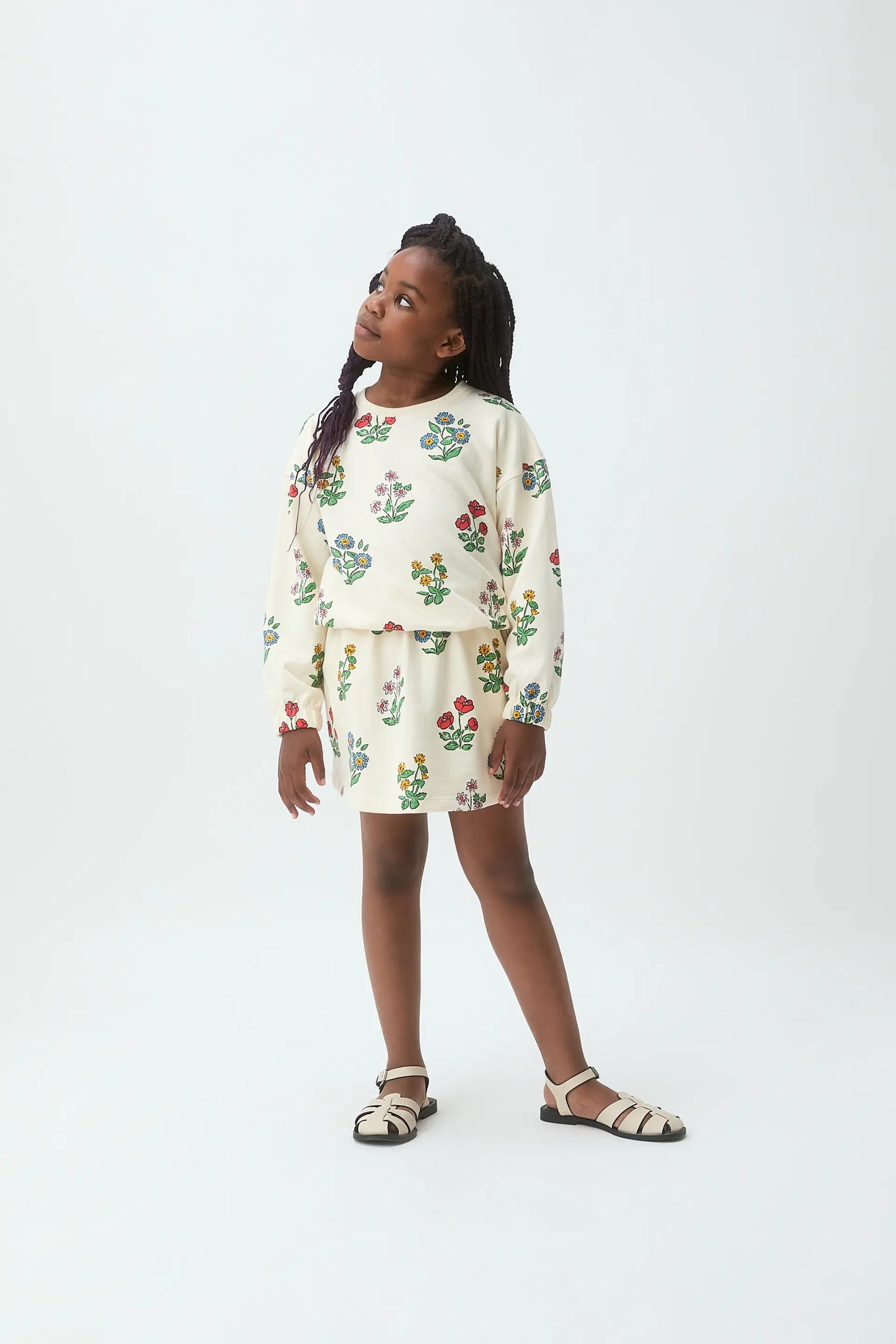 Falda corta de niña con estampado Gardener