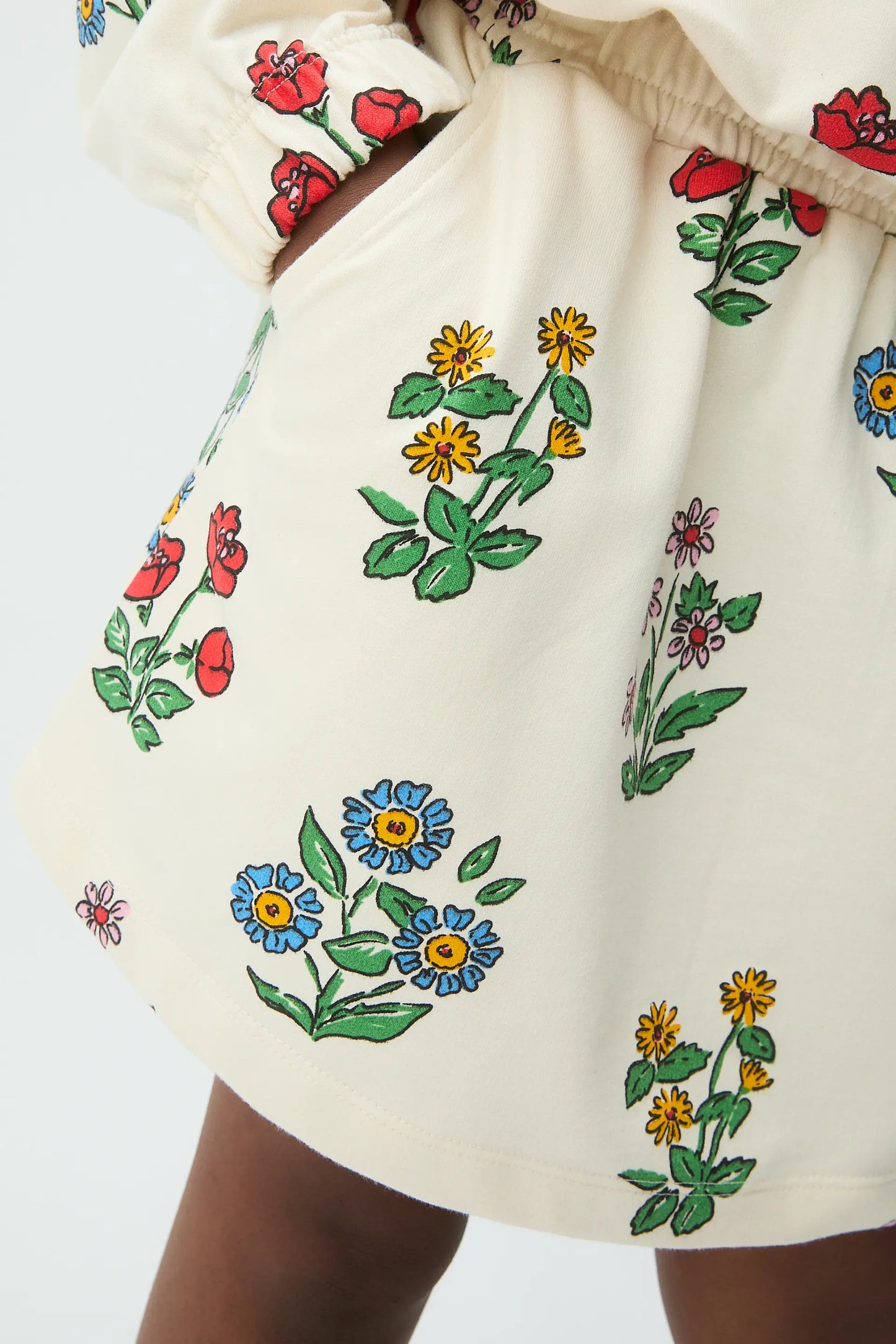 Falda corta de niña con estampado Gardener