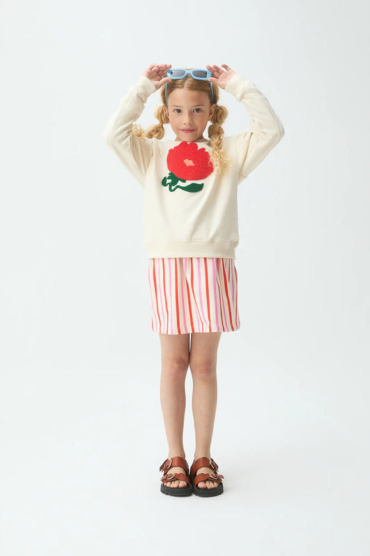 Sudadera de niña blanco roto con parche floral