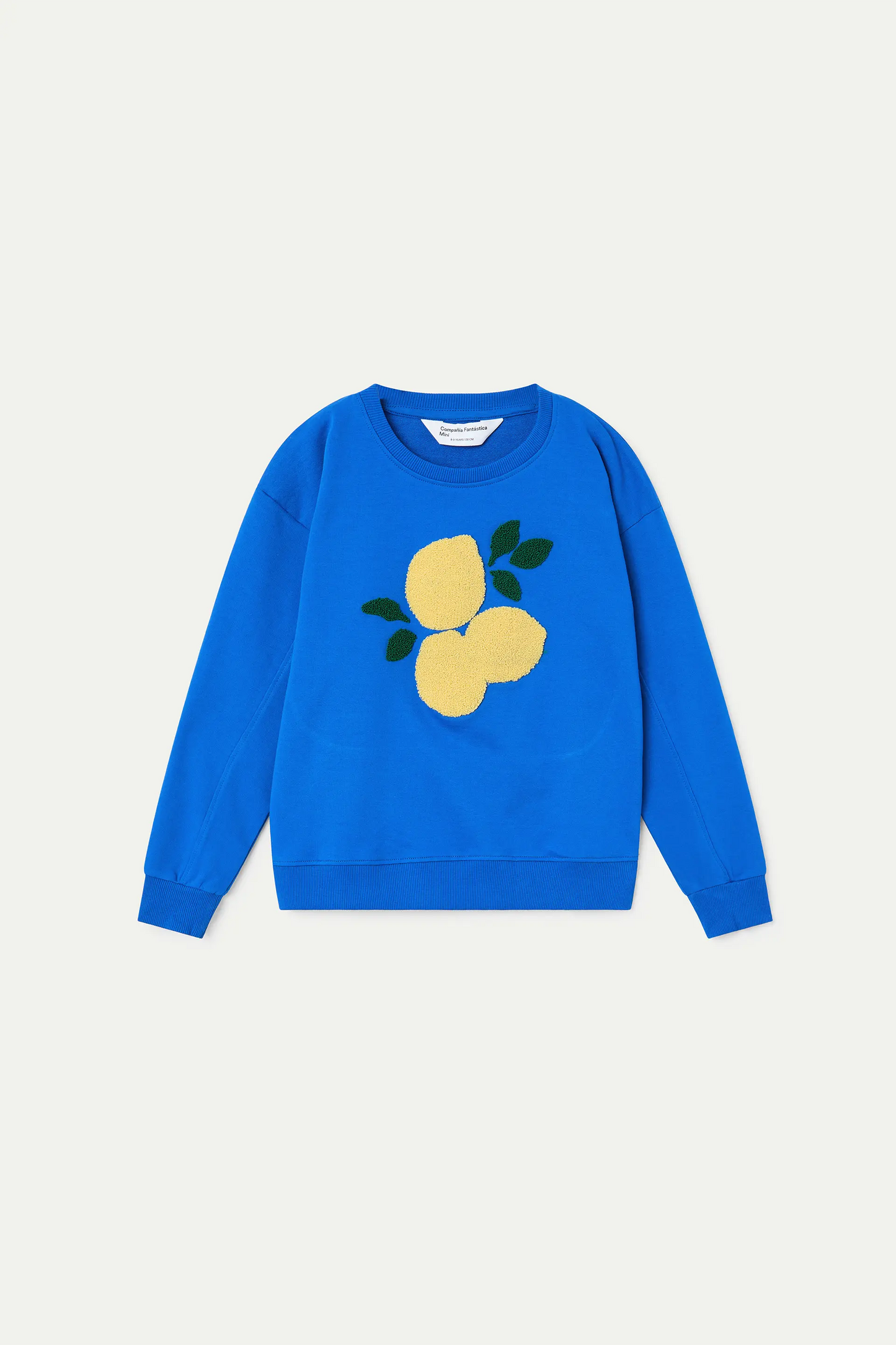 Sudadera de niña azul con parche de limones