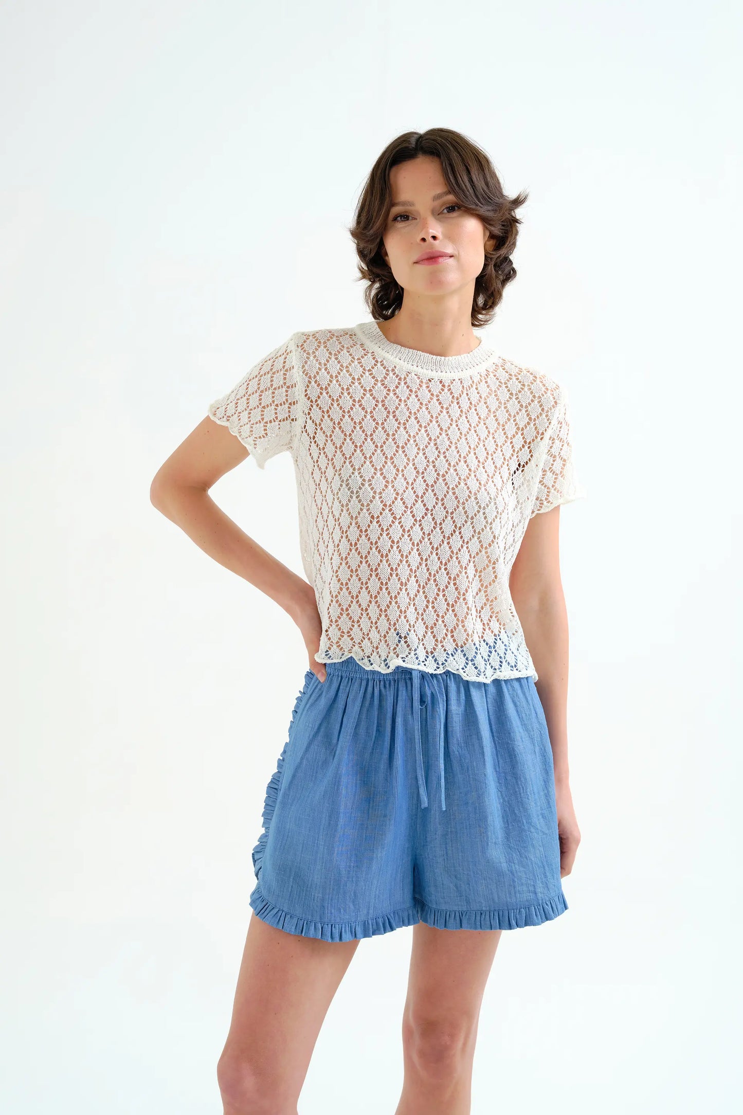 White openwork knit top with diamond pattern