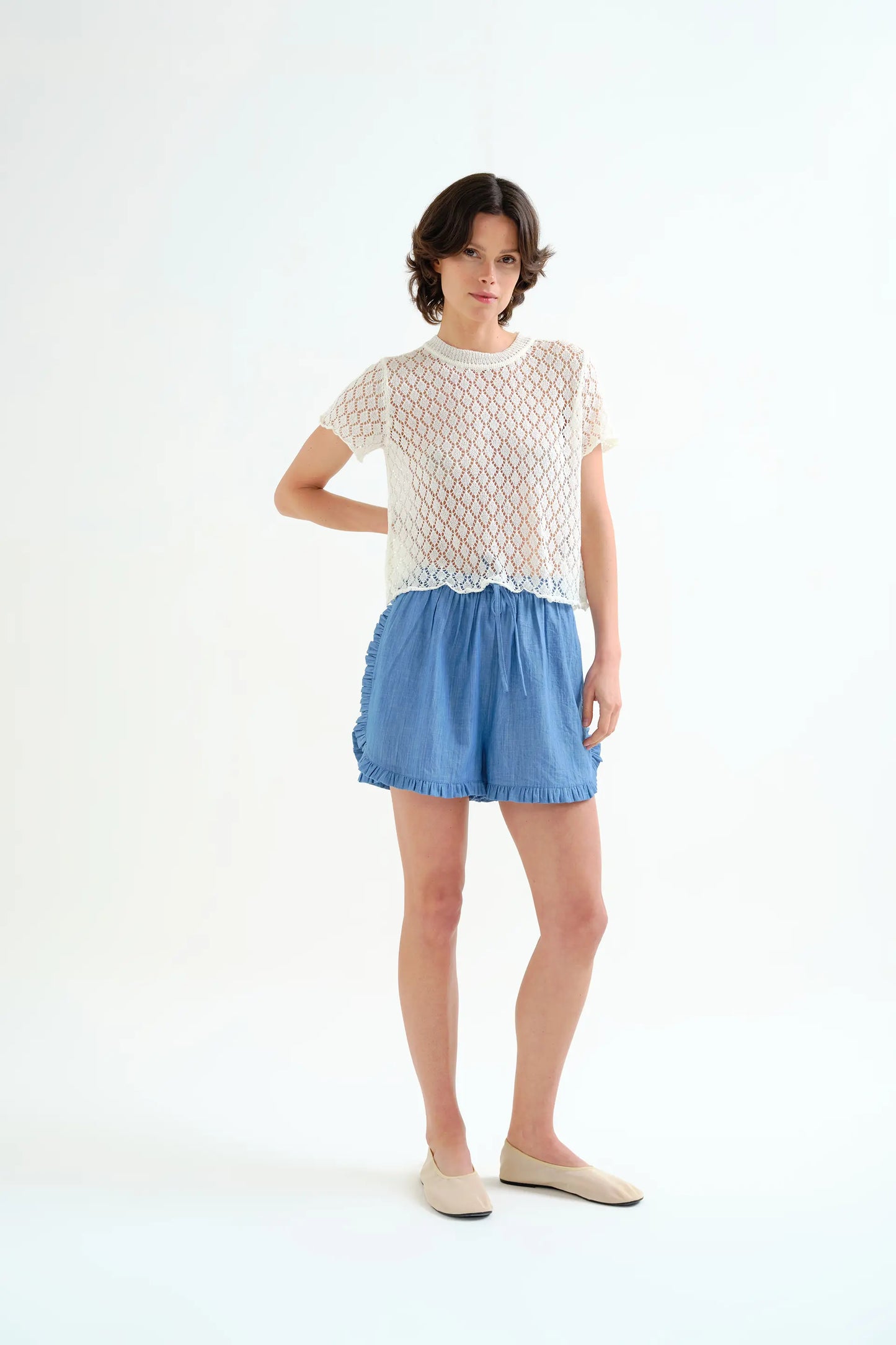 White openwork knit top with diamond pattern