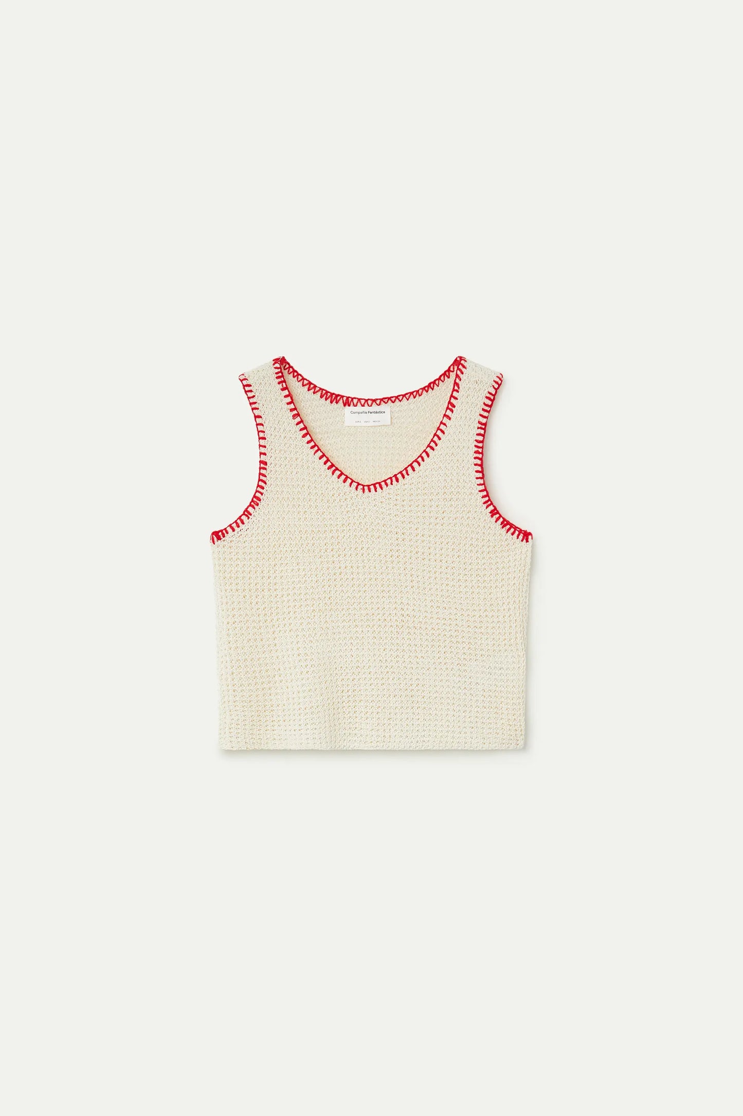 Off-white openwork knit top with red embroidered details