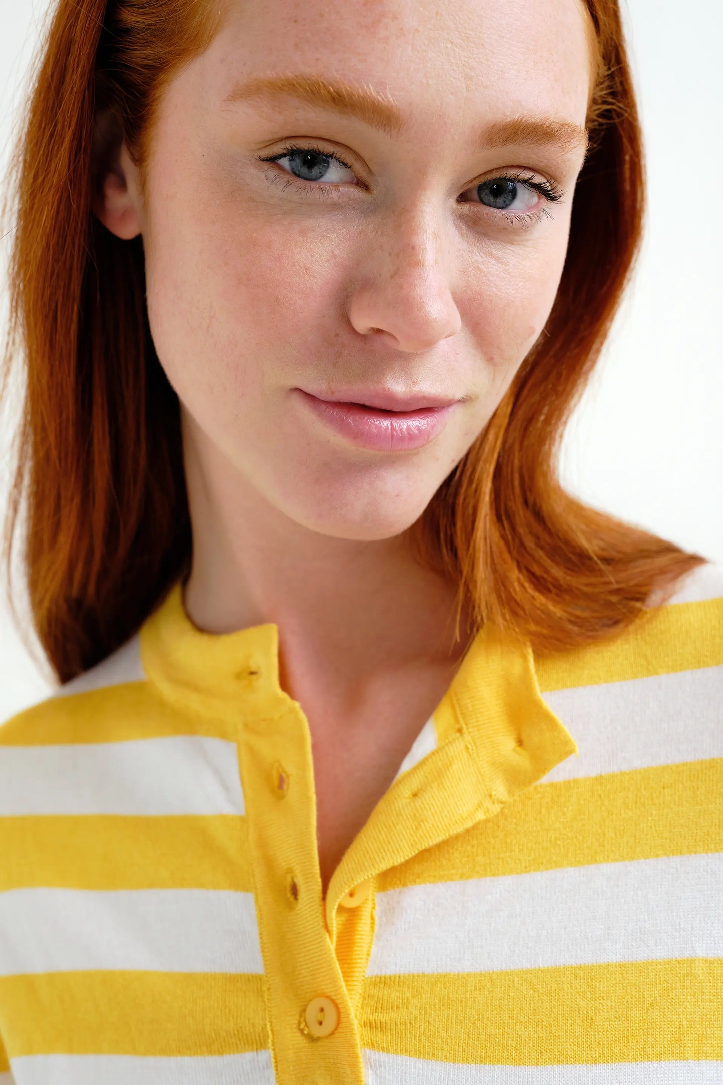 Top with white and yellow striped print