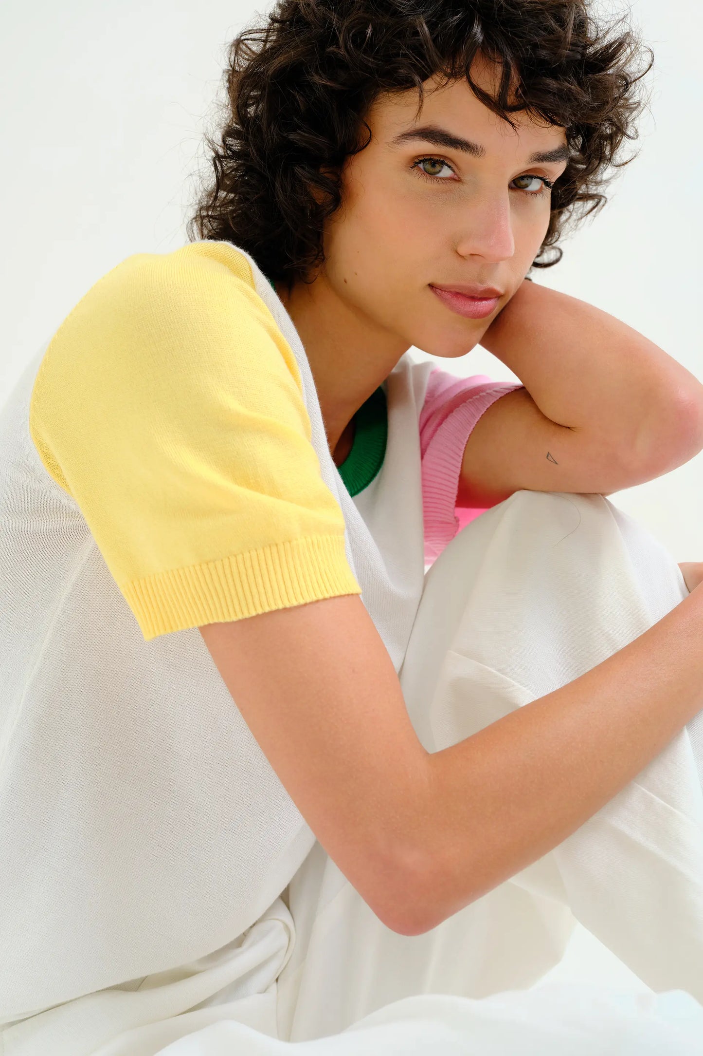 Knit top with multicolored details