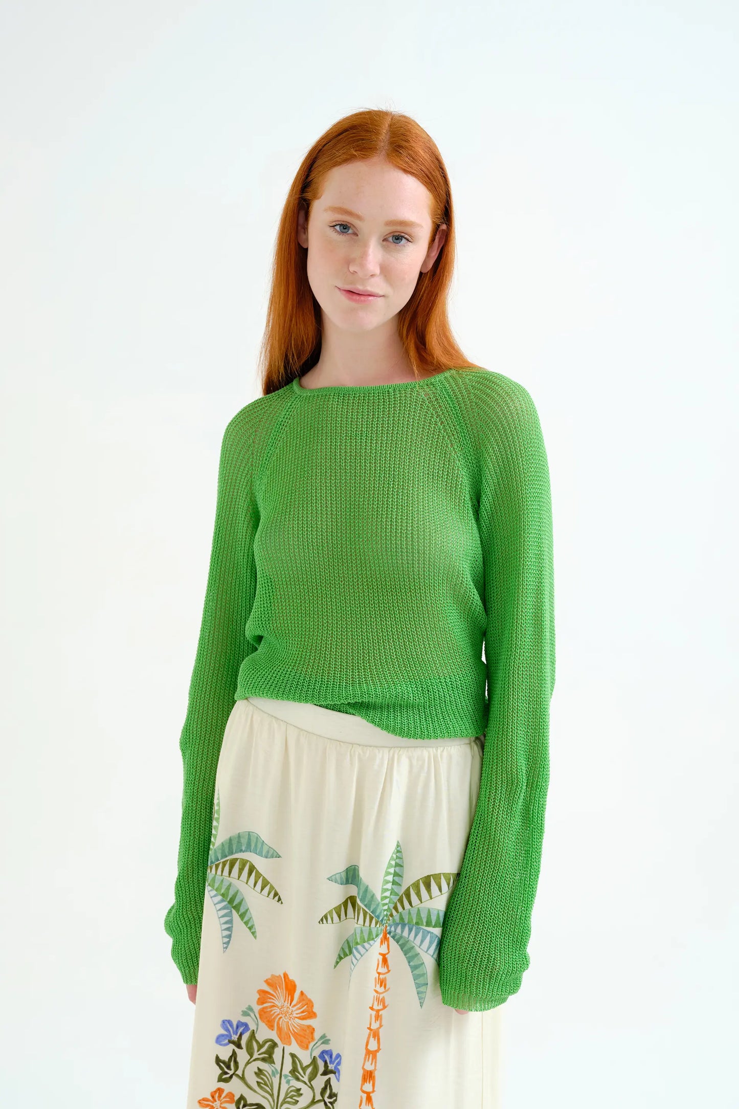 Green openwork knit sweater
