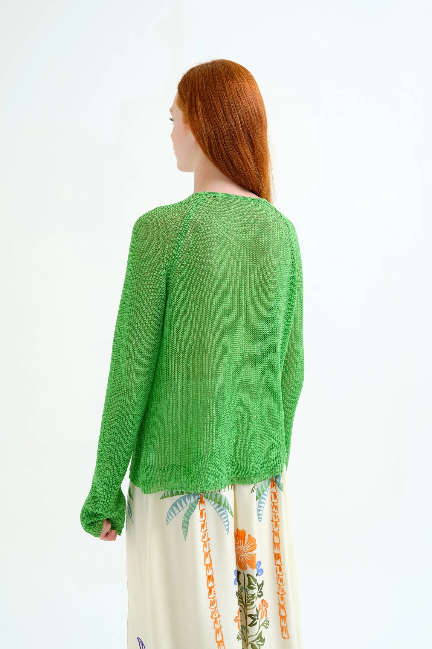 Green openwork knit sweater