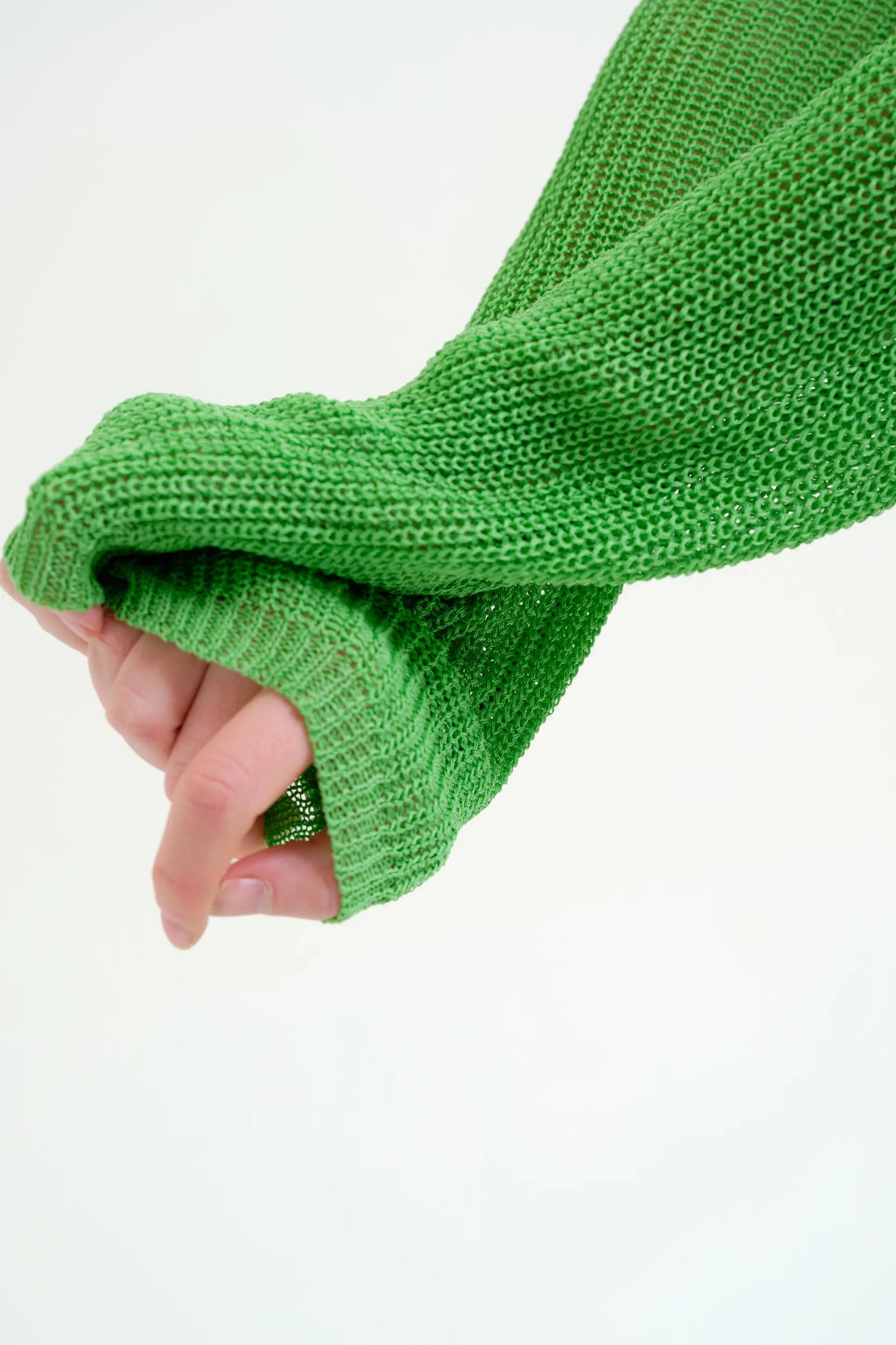 Green openwork knit sweater