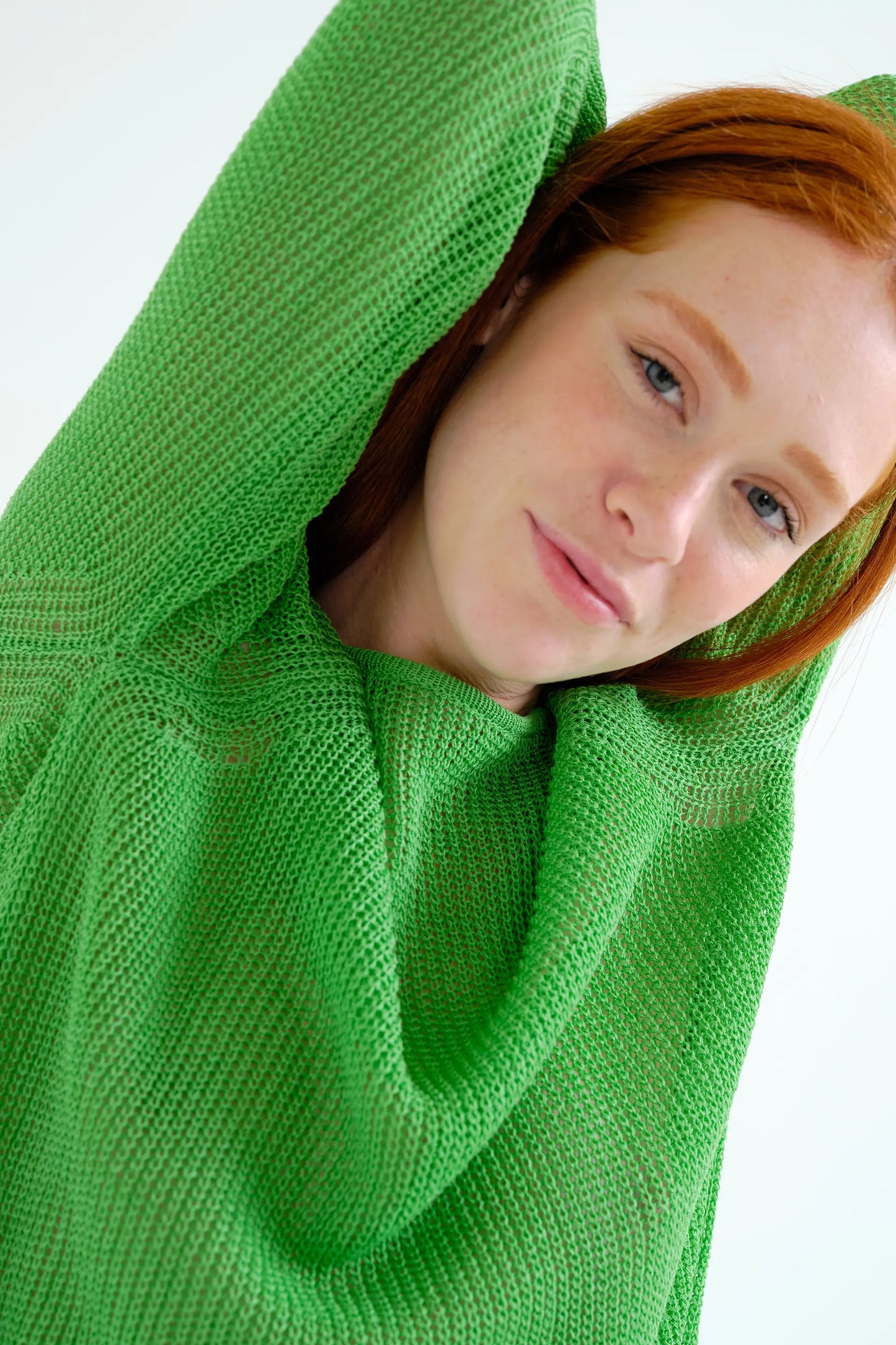 Green openwork knit sweater