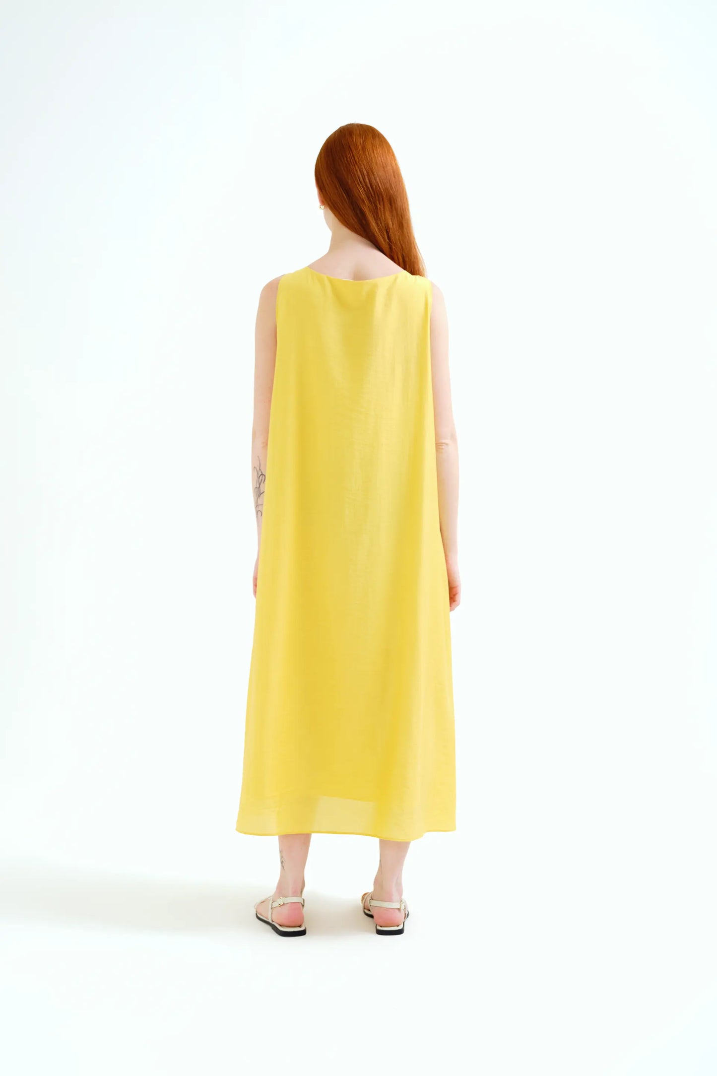 Long yellow dress with knotted detail