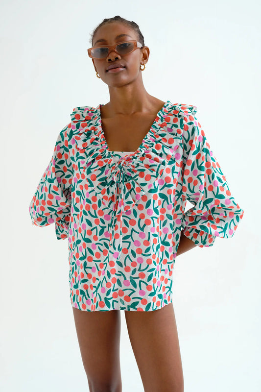 Top playero con estampado Guinda manga larga