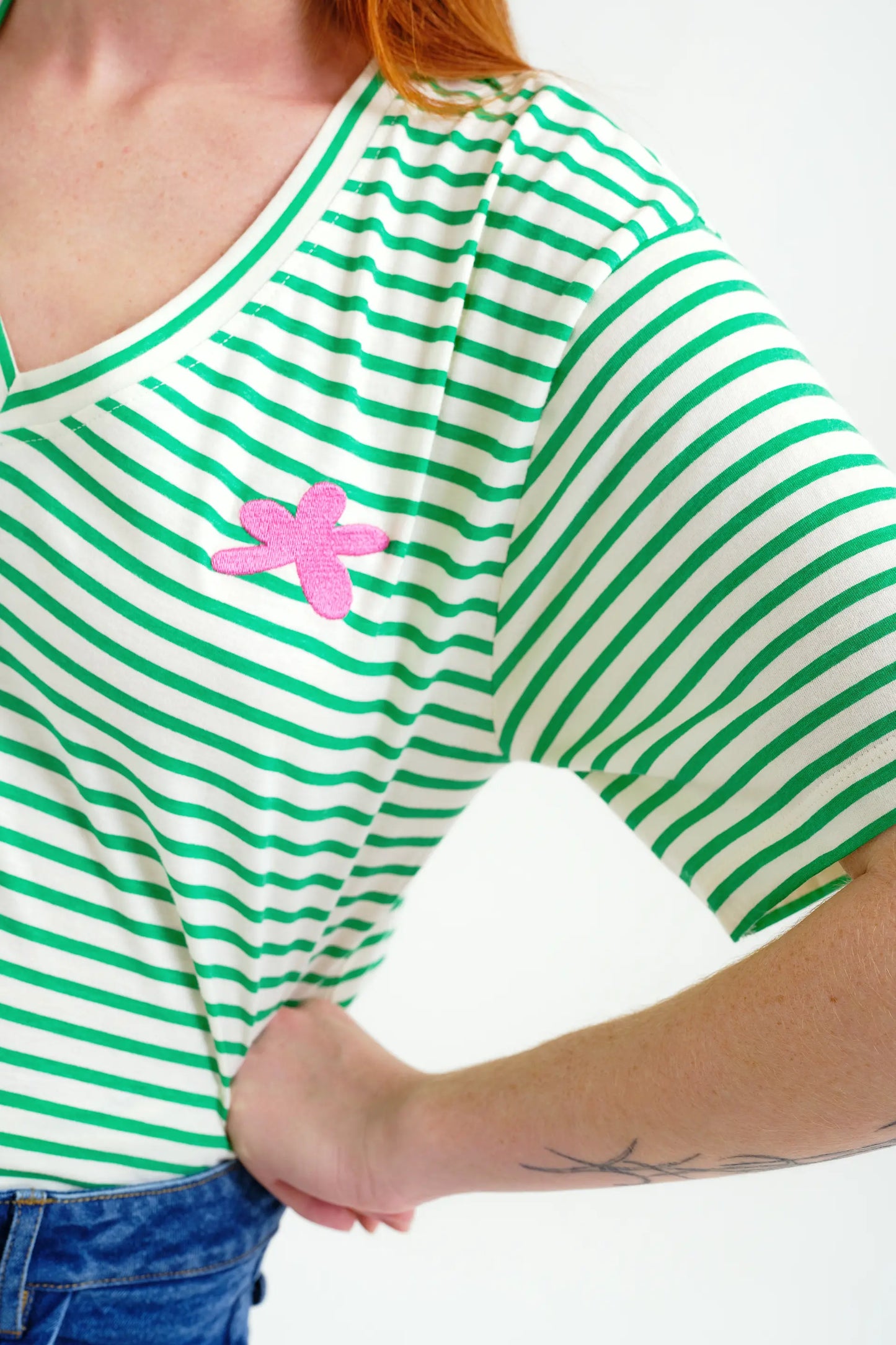 T-shirt with white and green striped print