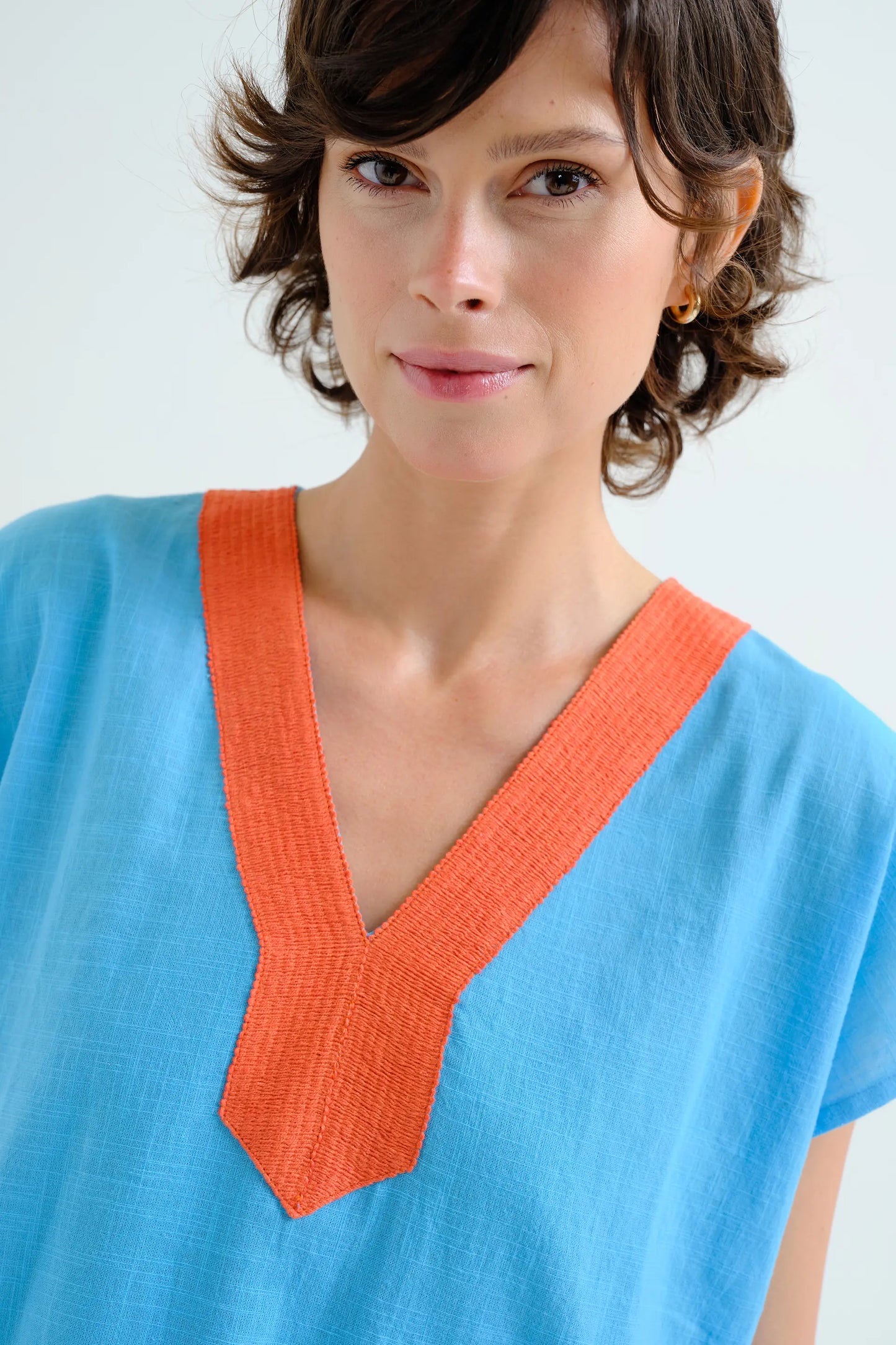 Short blue kaftan with orange neckline