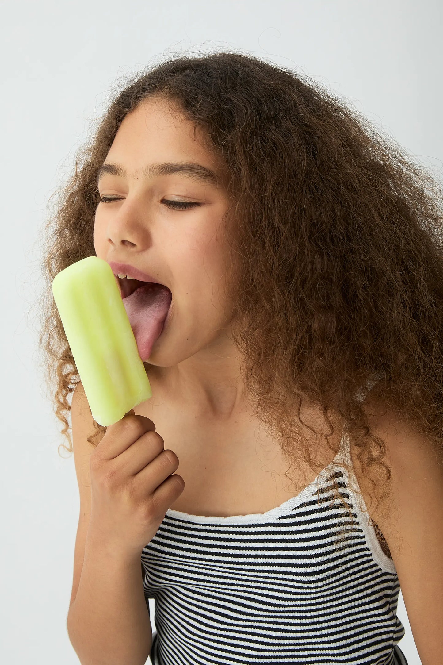 Girls' black and white striped top