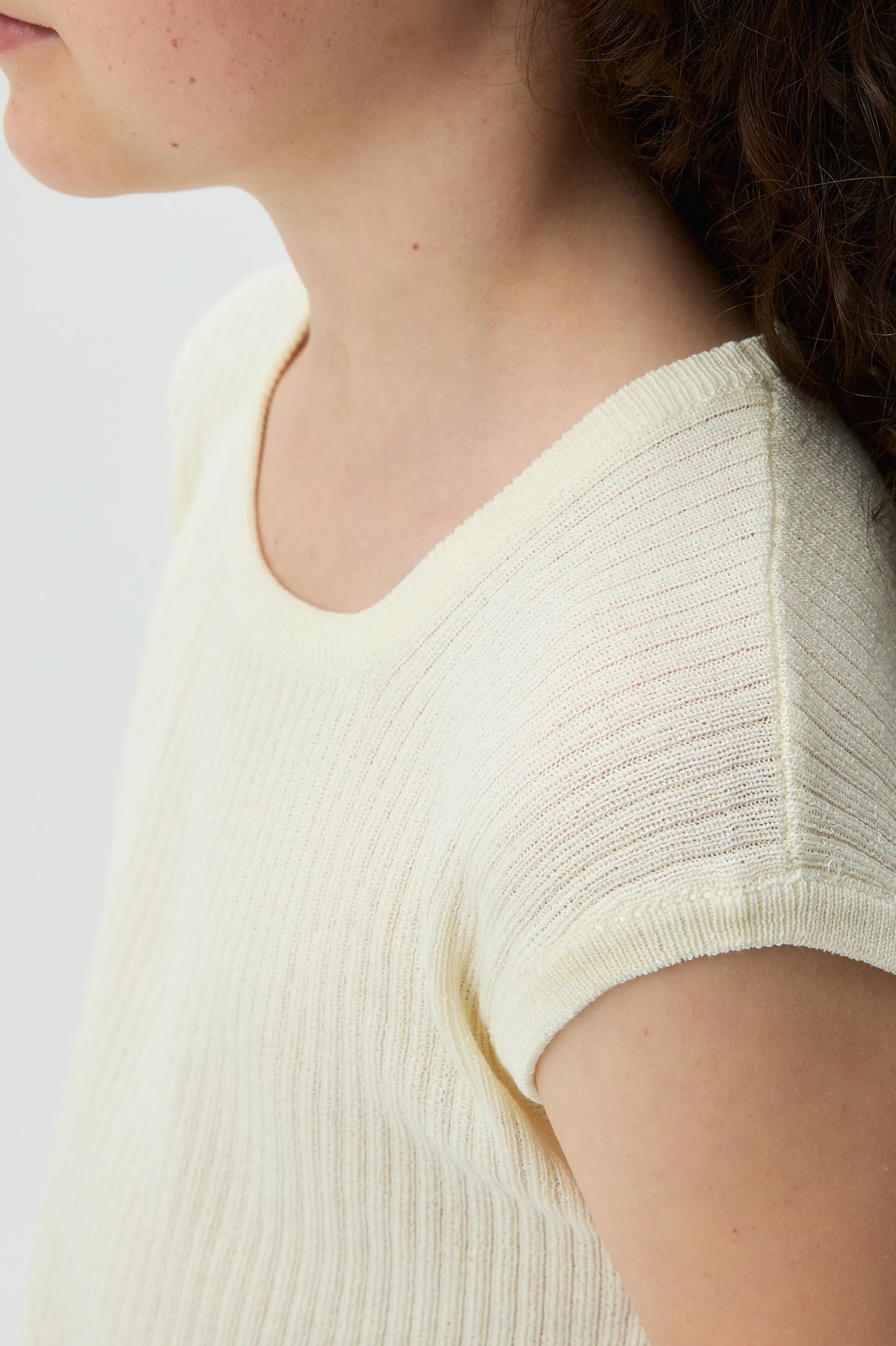 off-white short-sleeved knit top for girls
