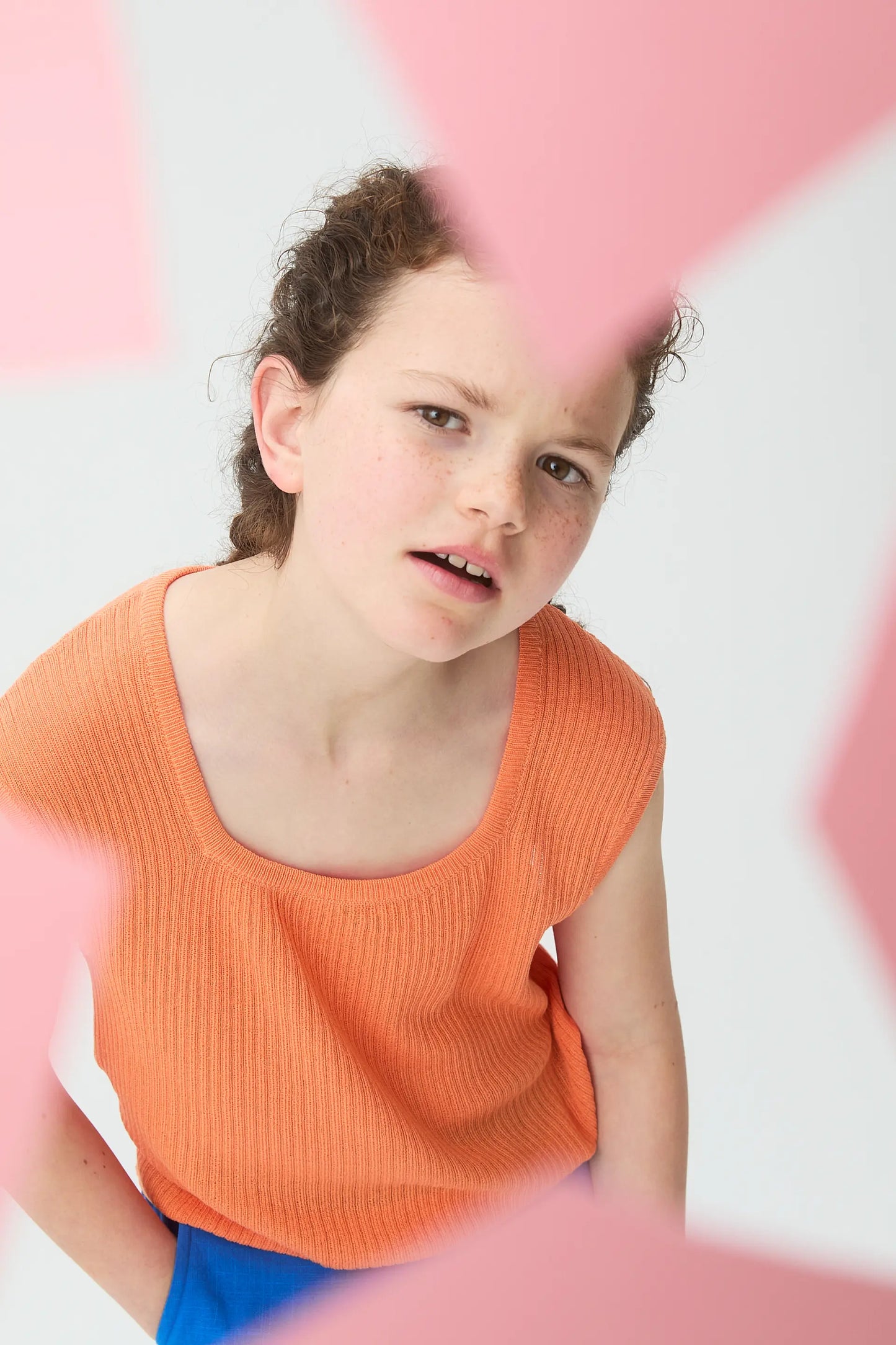 Orange knit top with short sleeves for girls