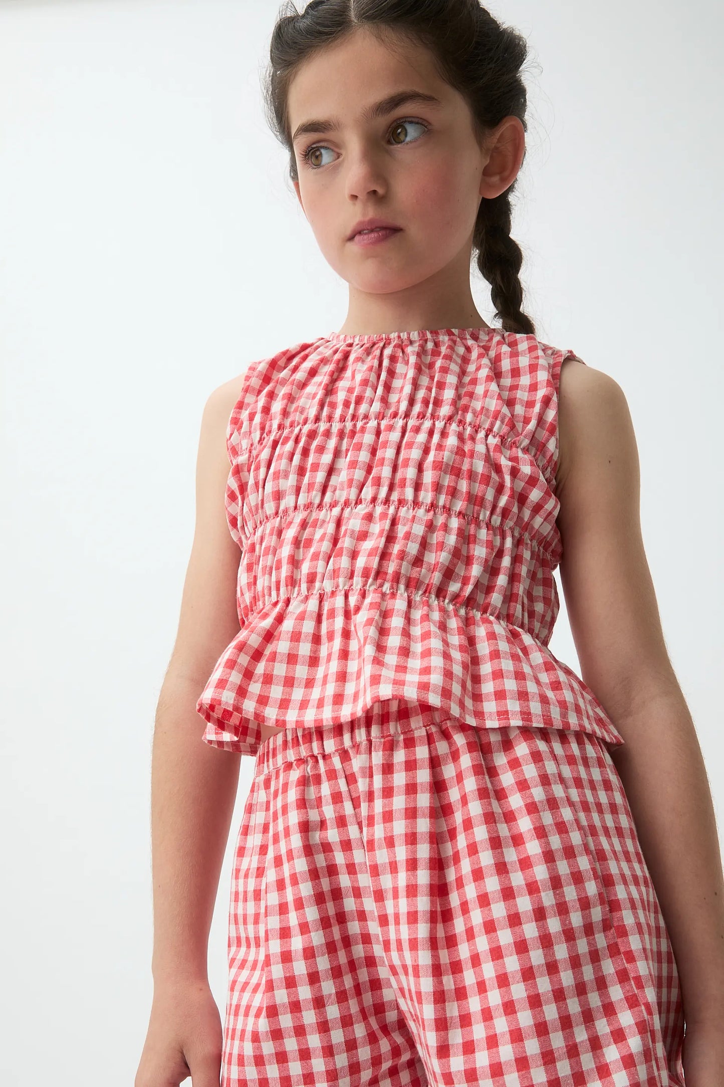 Girl's top with red gingham print
