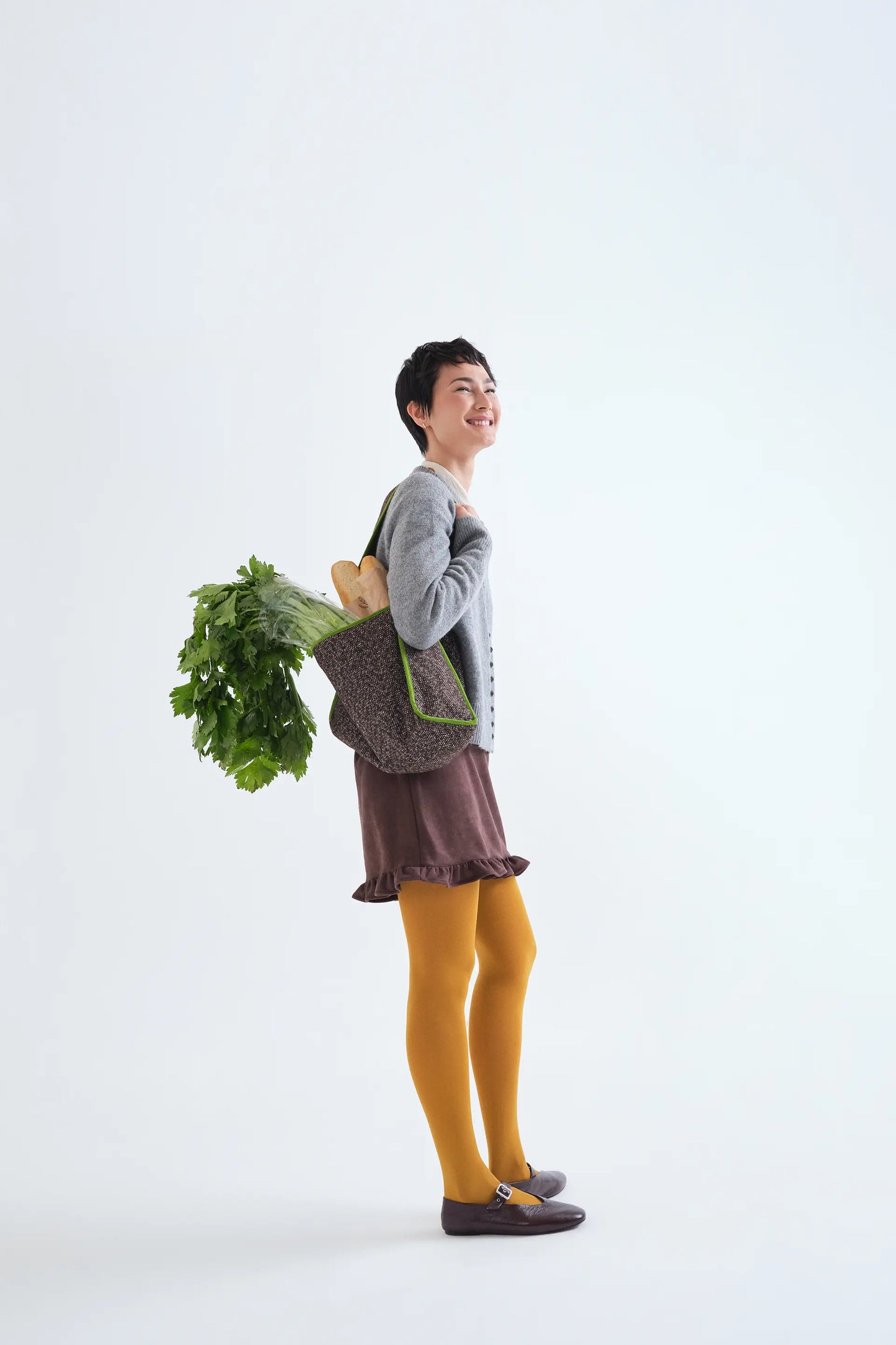 Cardigan grigio chiaro con bottoni neri