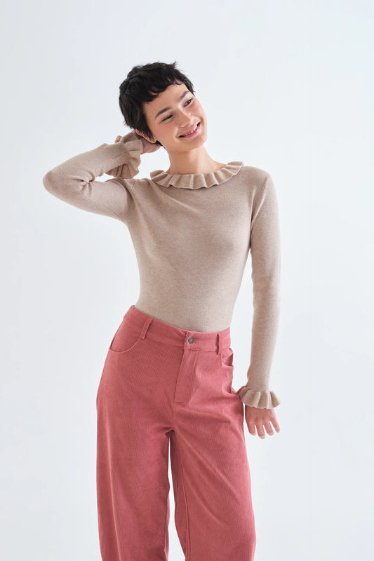 Top con volantes de punto beige