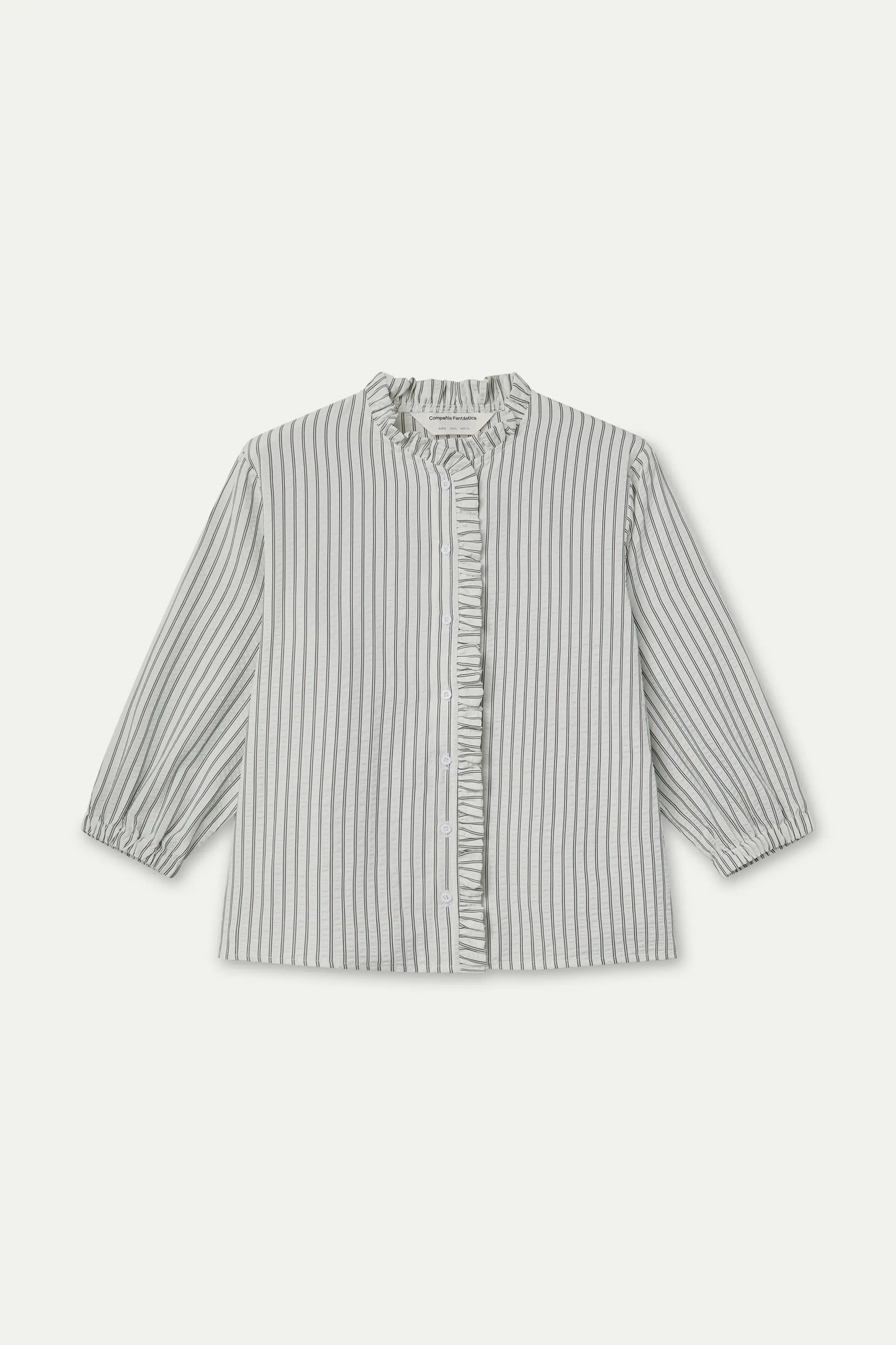 Camisa de rayas negra con detalle de volantes
