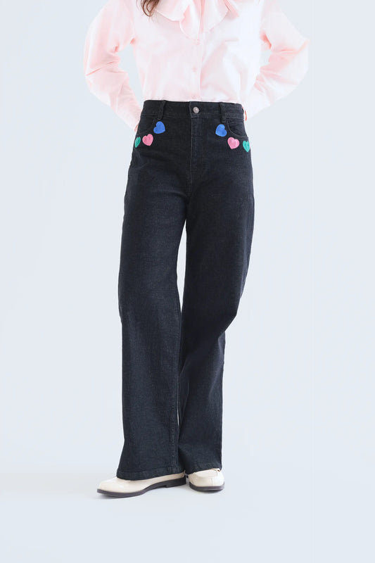 Pantalón vaquero negro con estampado Candy