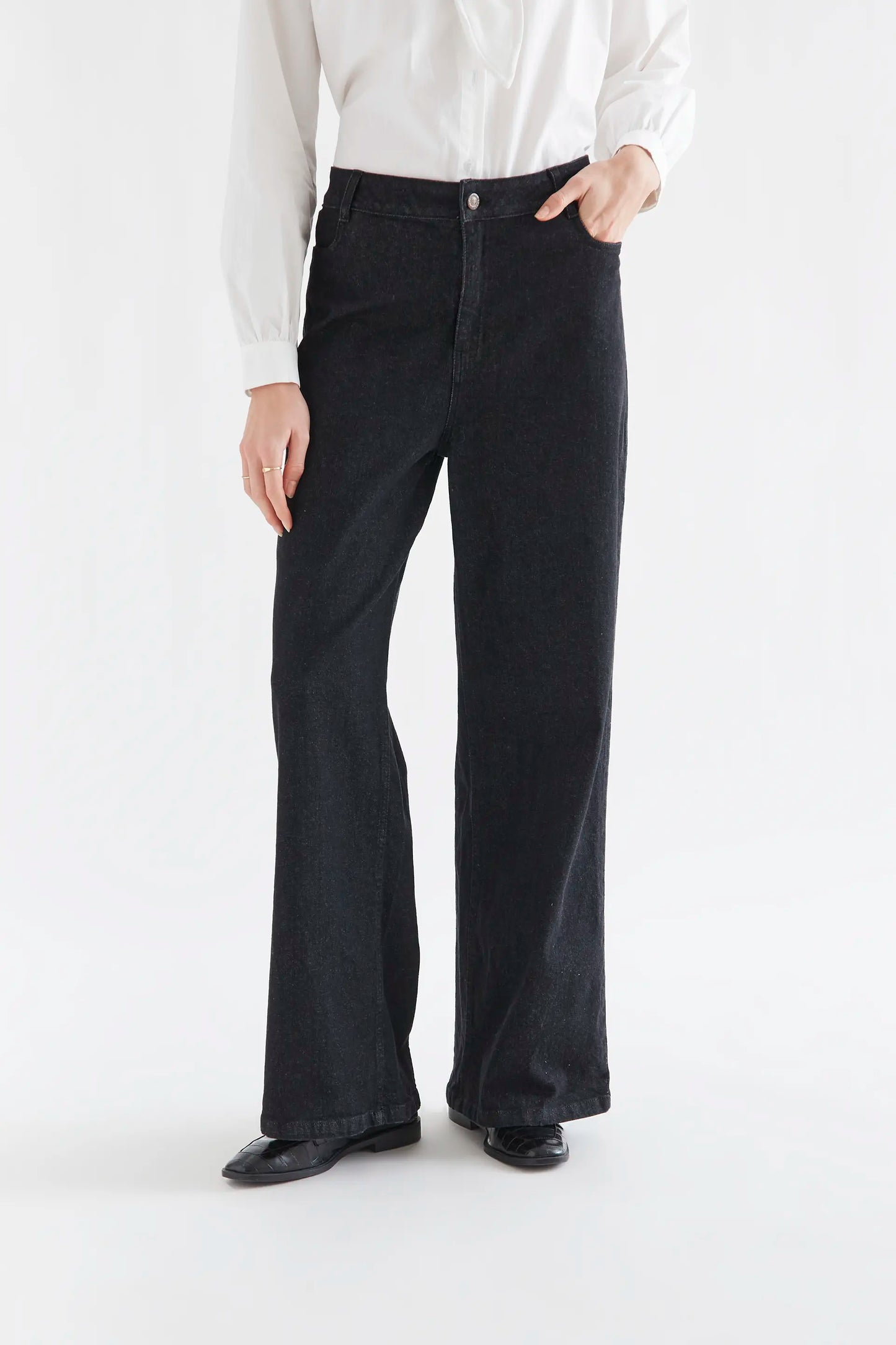 Black denim pants with heart pockets