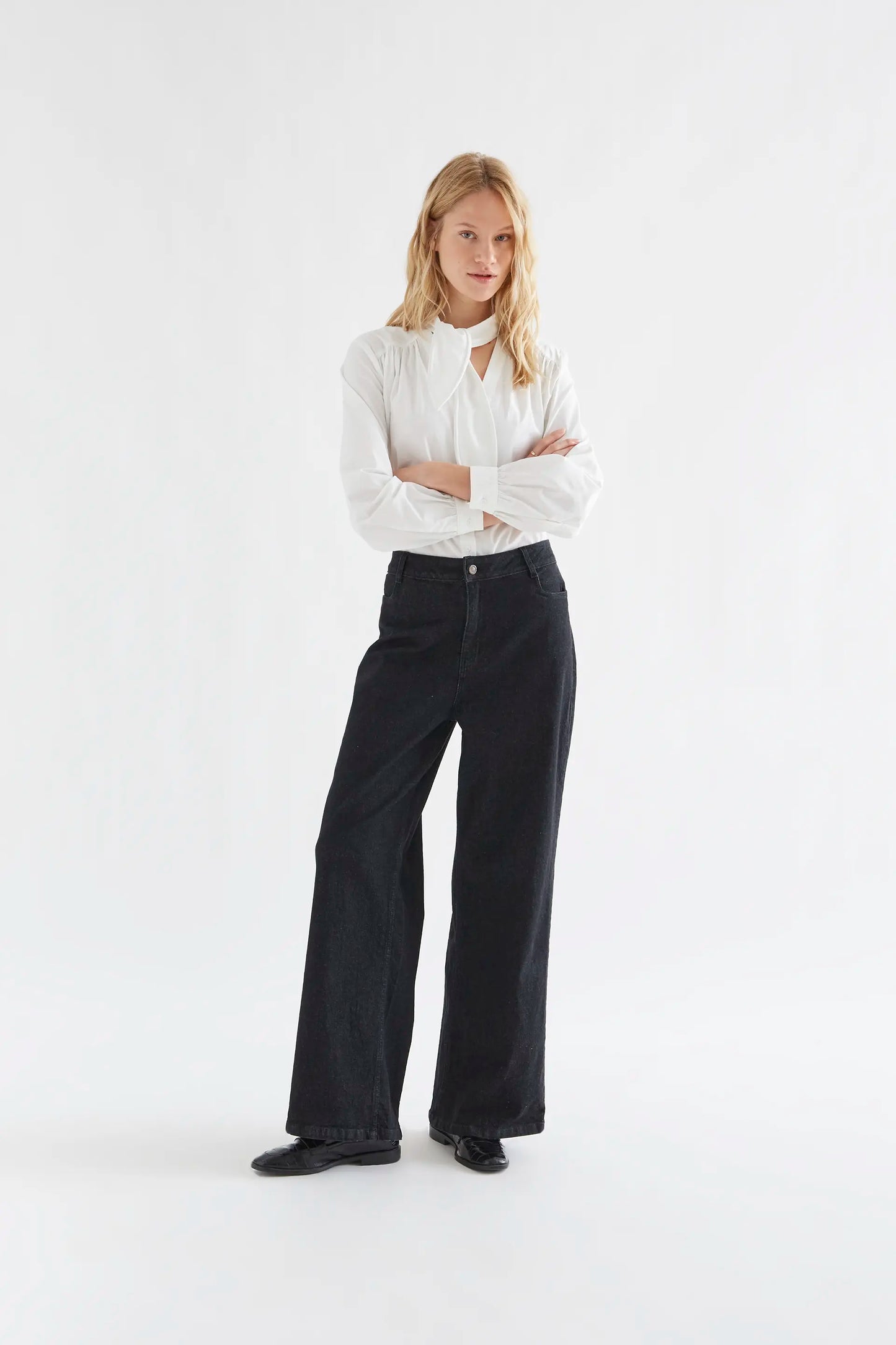 Black denim pants with heart pockets