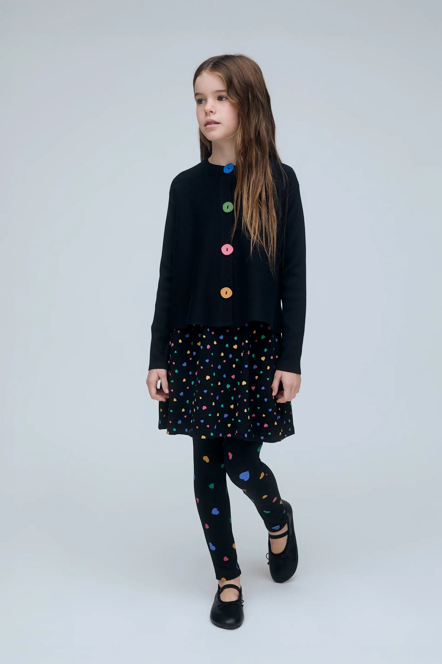 Girl's black cardigan with multicolored buttons