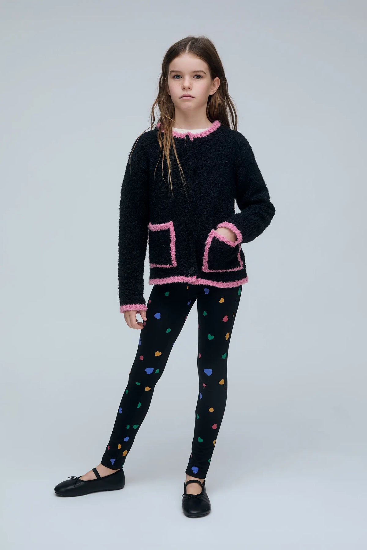 Girl's black and pink cardigan