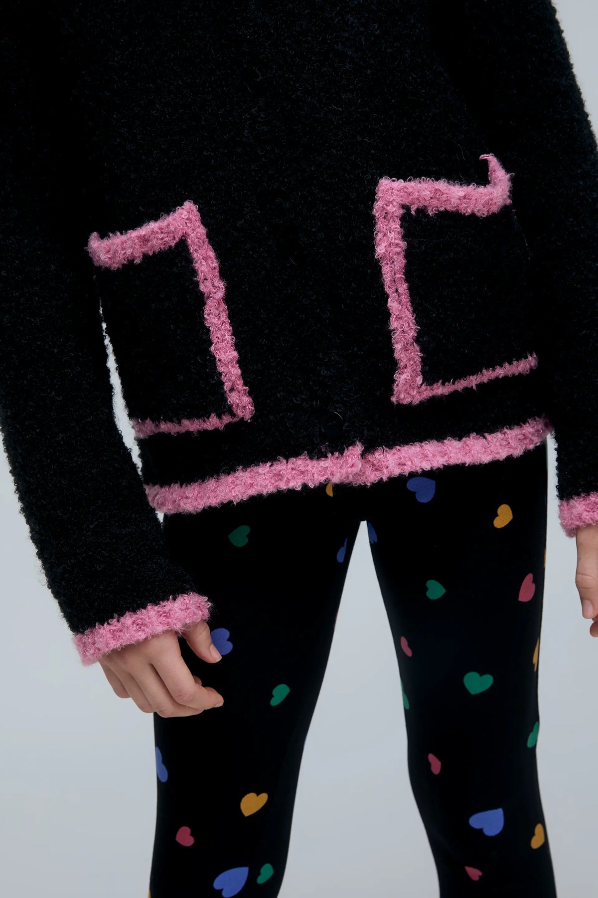 Girl's black and pink cardigan