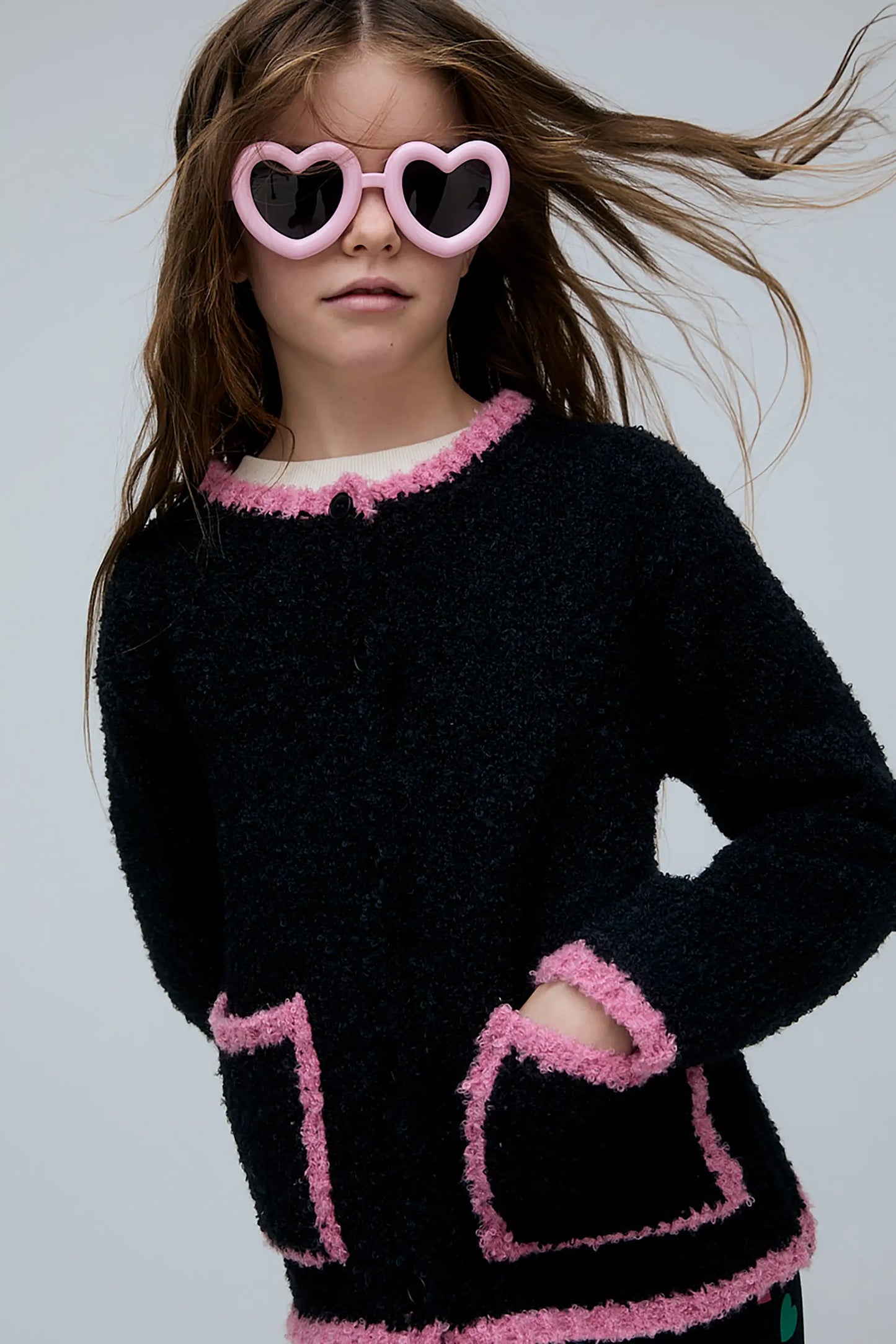 Girl's black and pink cardigan