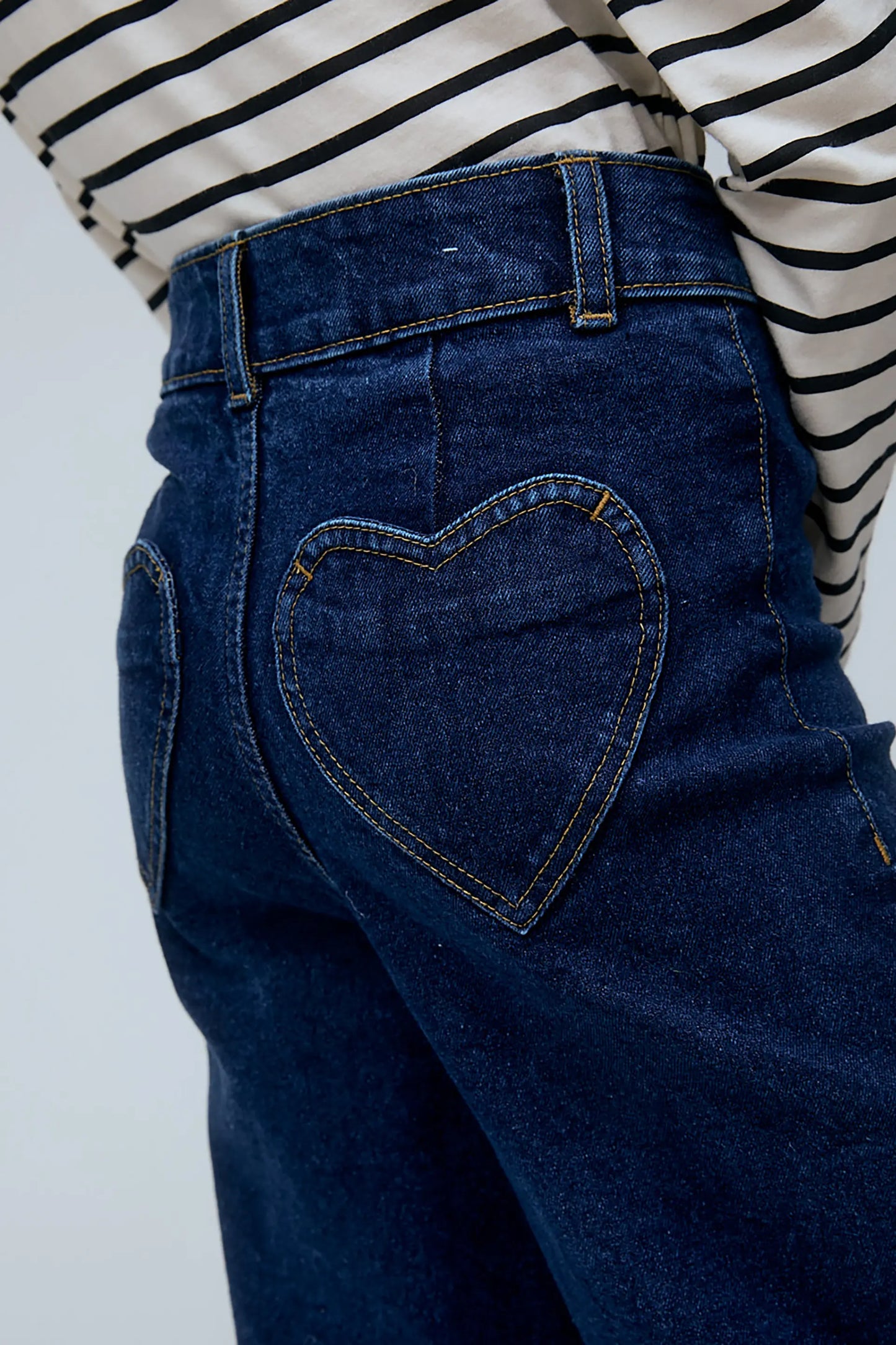 Jeans bambina blu navy con tasche a cuore